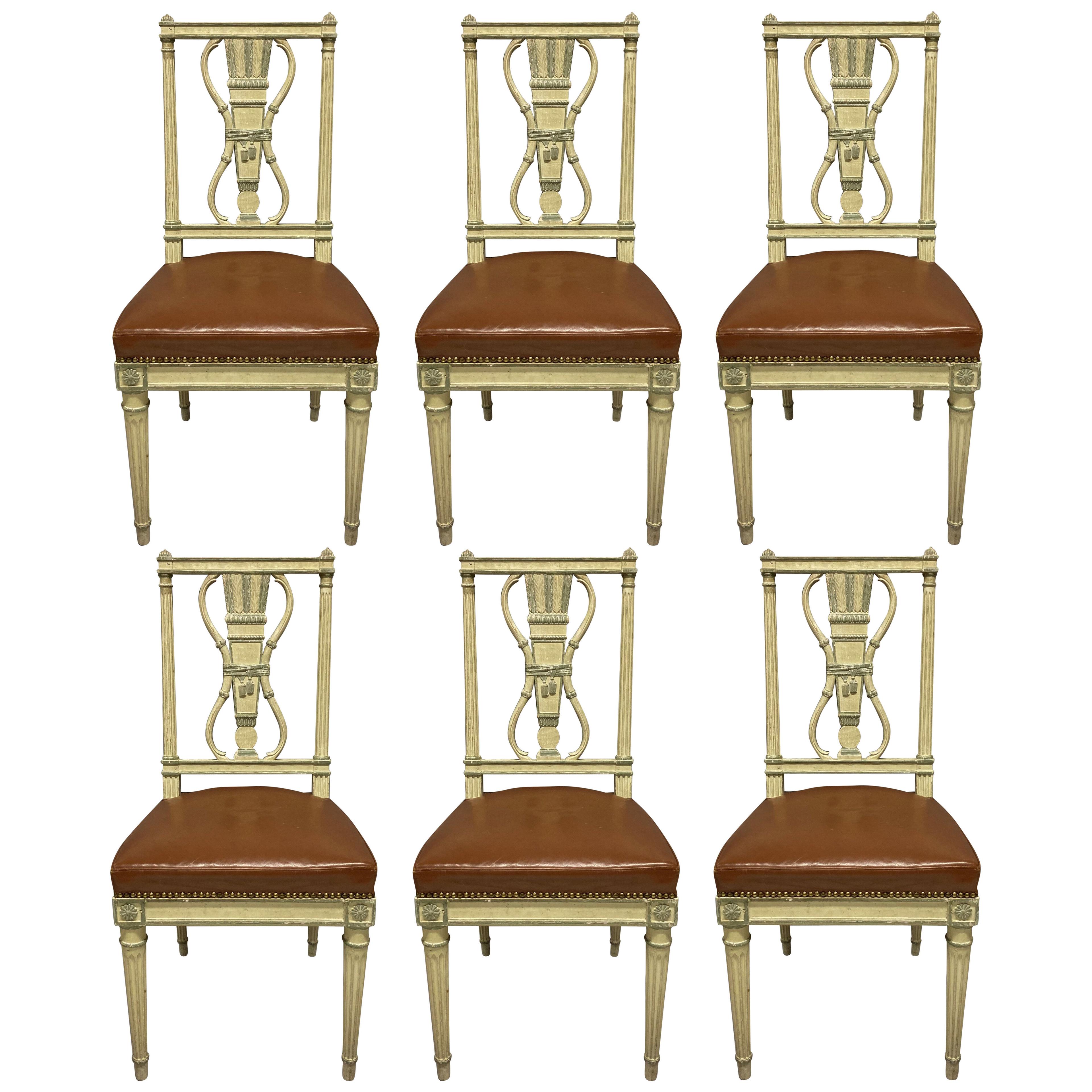 A SET OF SIX LOUIS XVI STYLE PAINTED DINING CHAIRS