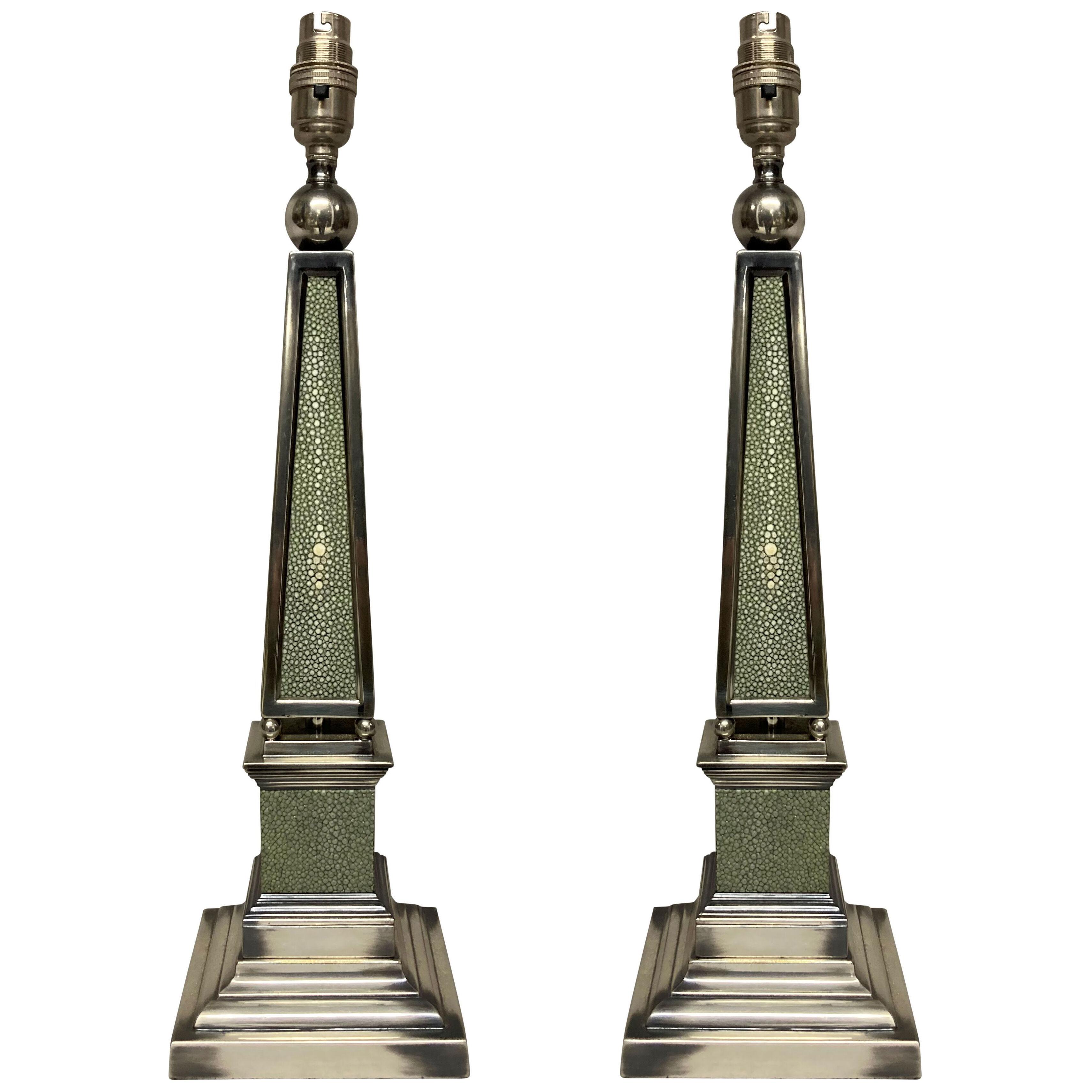 A PAIR OF SILVER PLATED OBELISK LAMPS
