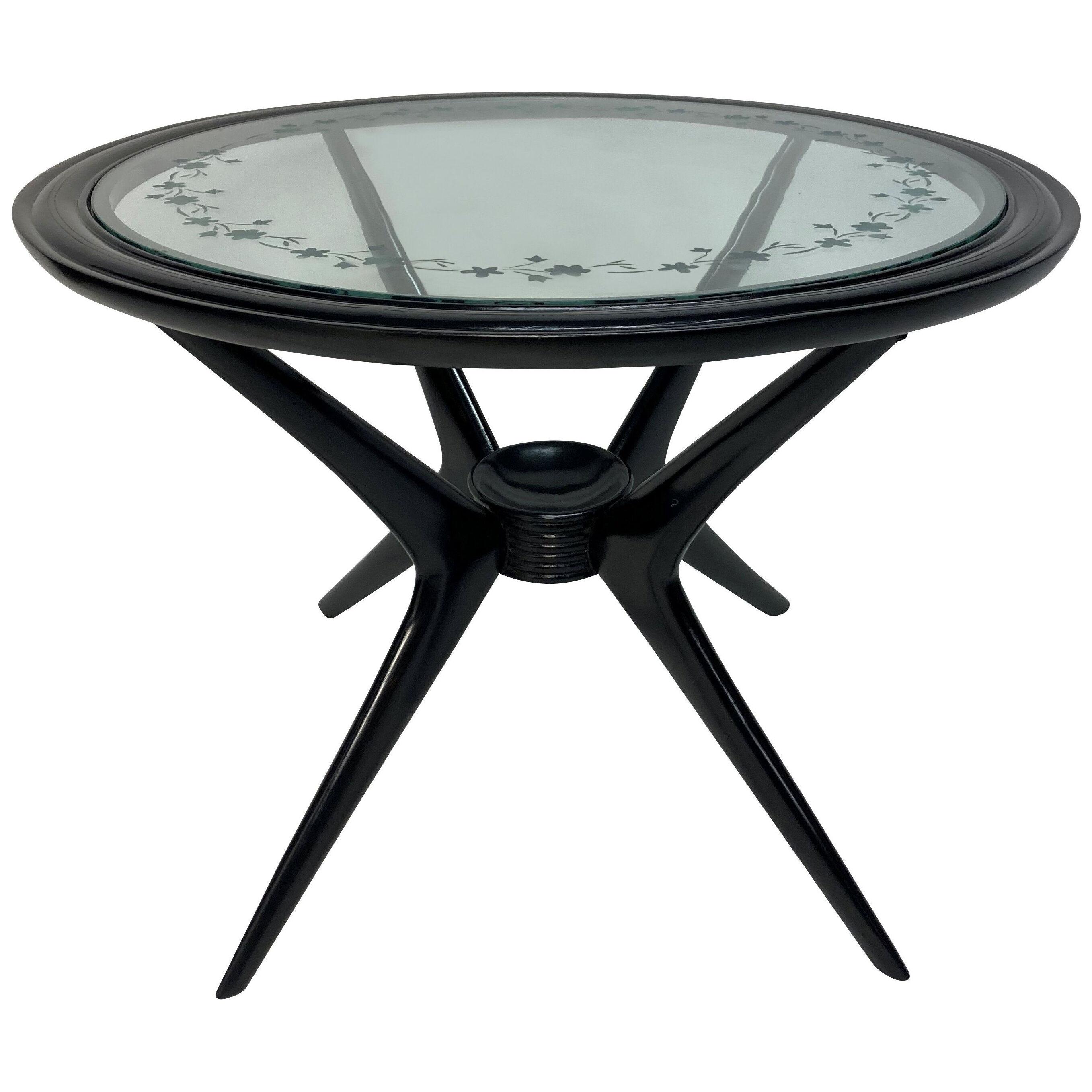 AN ITALIAN CIRCULAR OCCASIONAL TABLE BY CASSINA