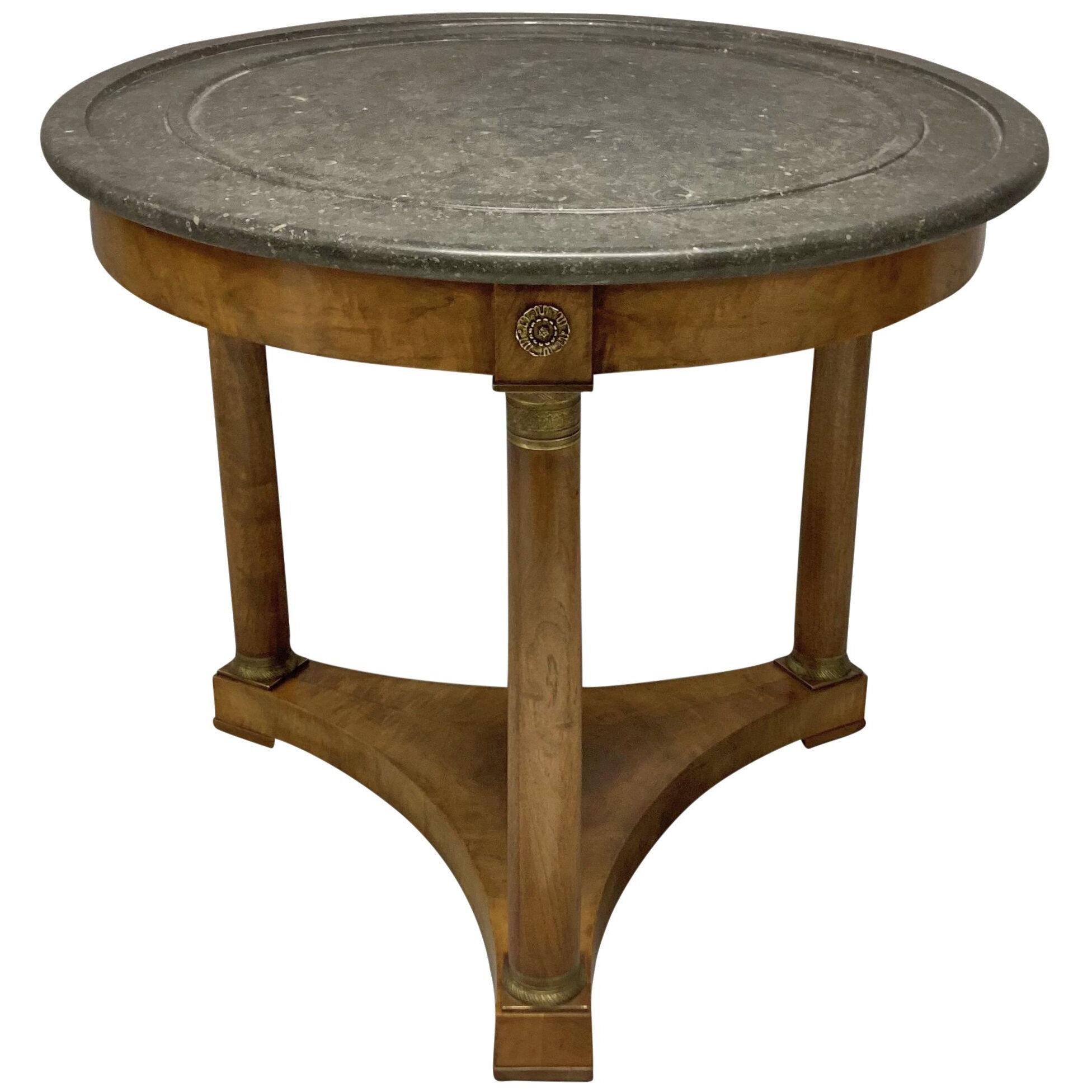 A FRENCH EMPIRE STYLE GUERIDON TABLE