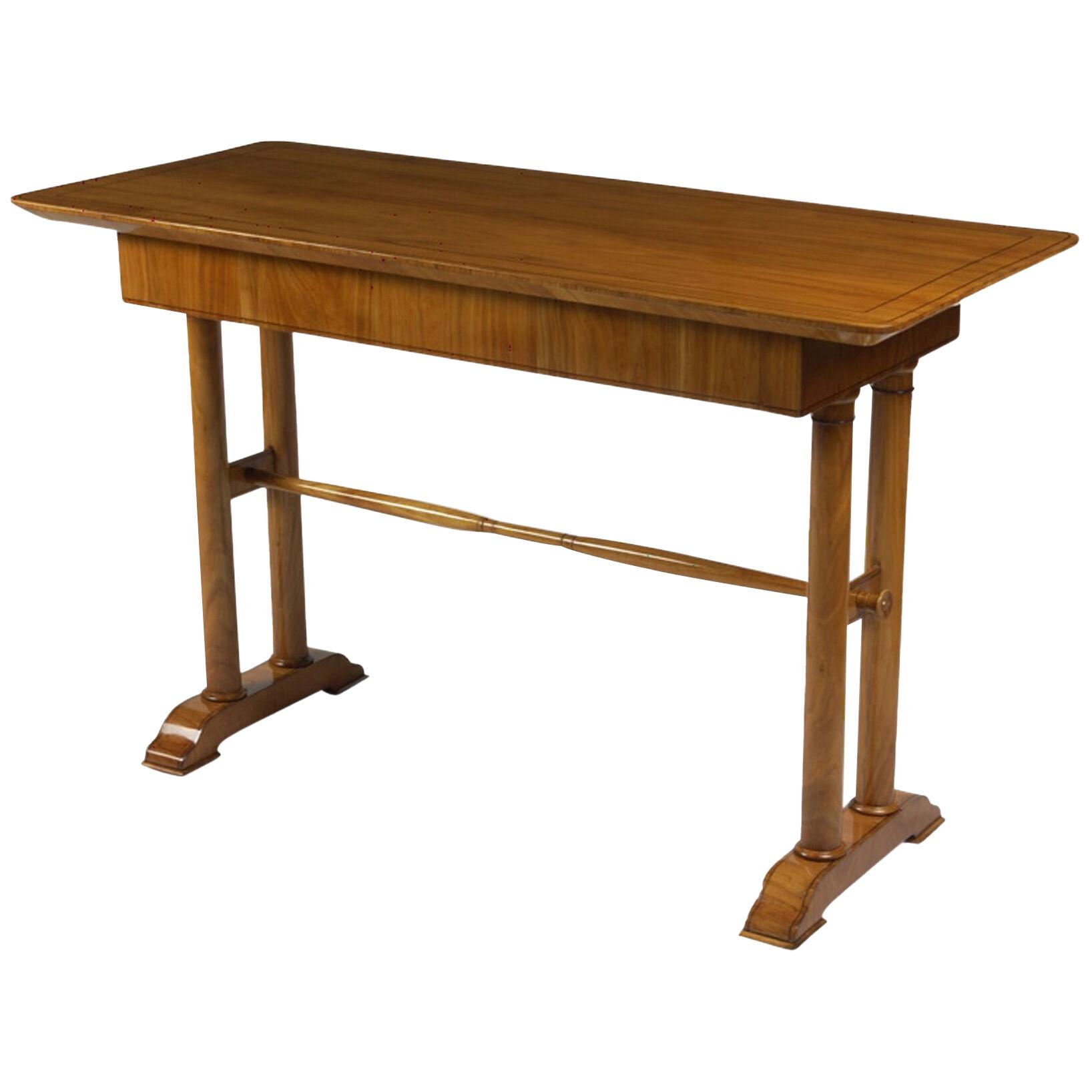 A Biedermeier writing Table with single drawer