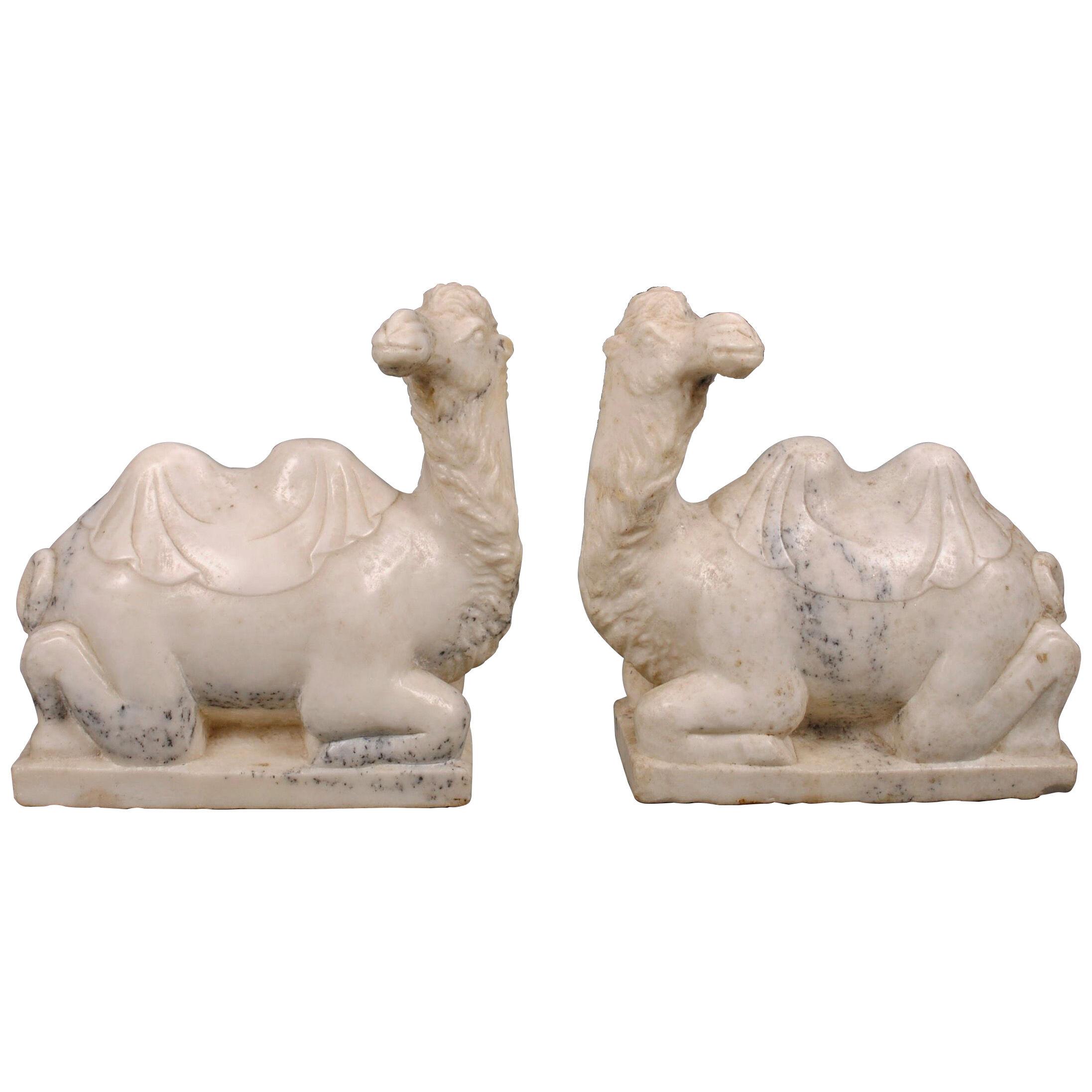A PAIR OF WHITE MARBLE CAMELS