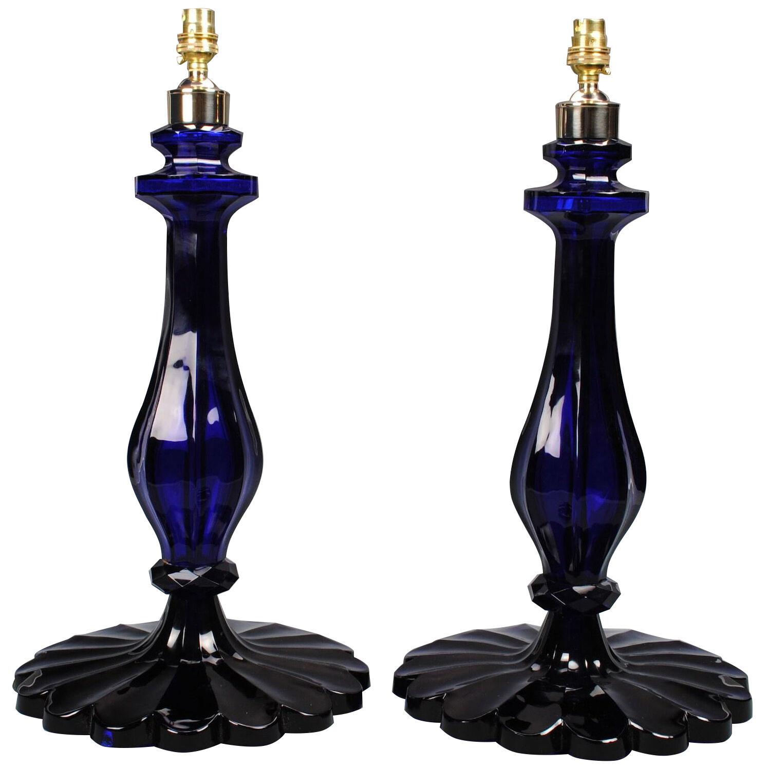 A PAIR OF BLUE GLASS TABLE LAMPS