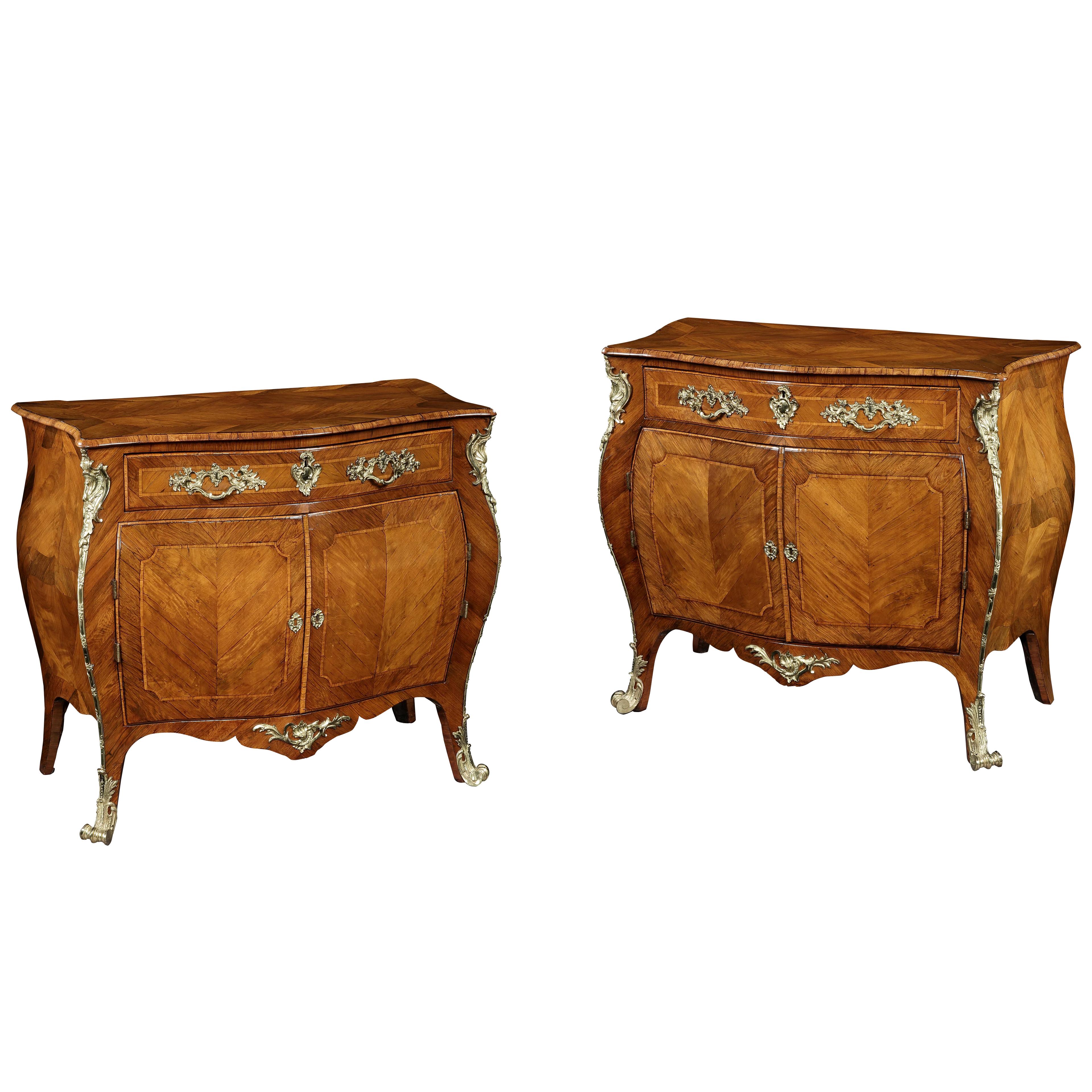  A PAIR OF BOMBE COMMODES