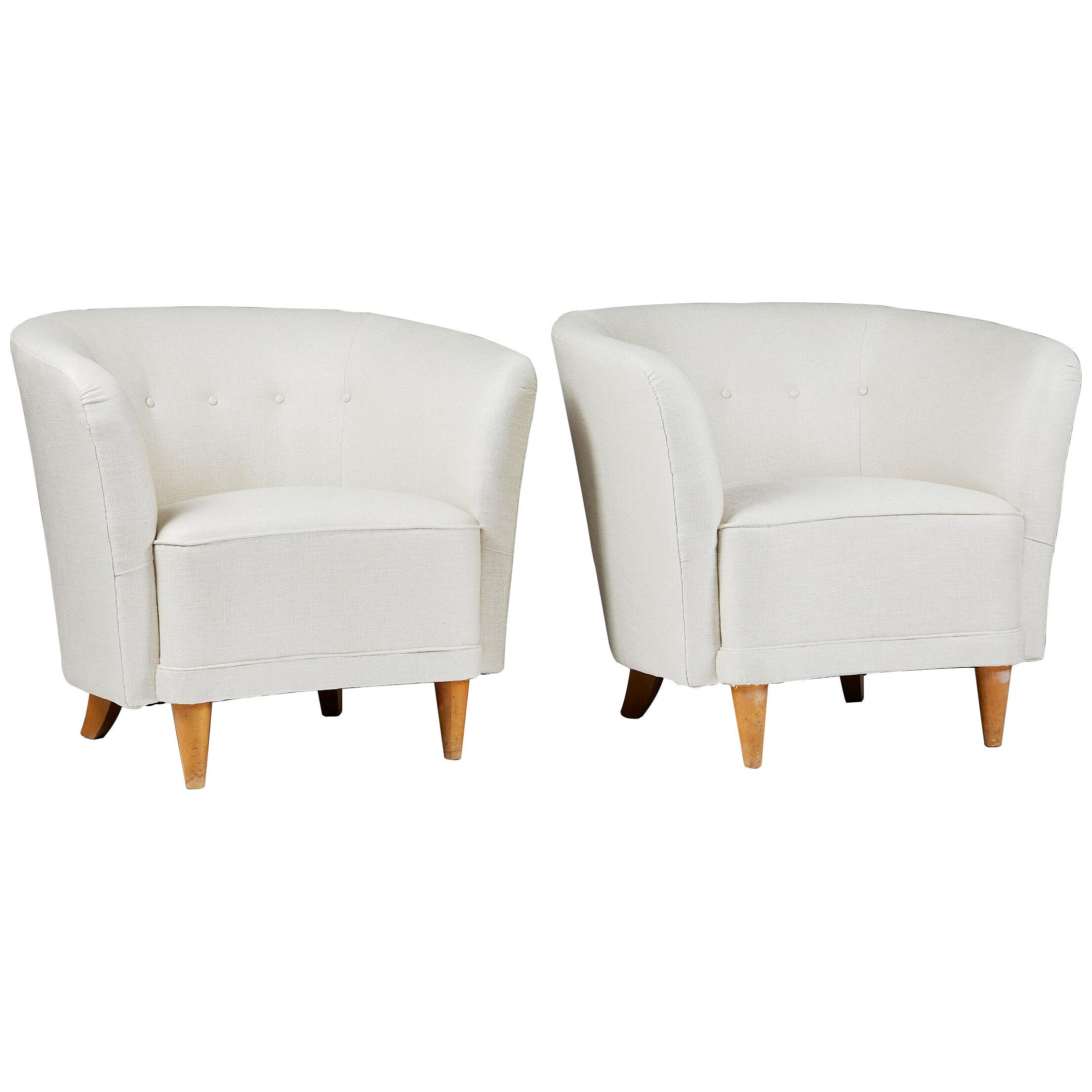Pair of easy chairs attributed to Carl Johan Boman, Finland, 1950's.