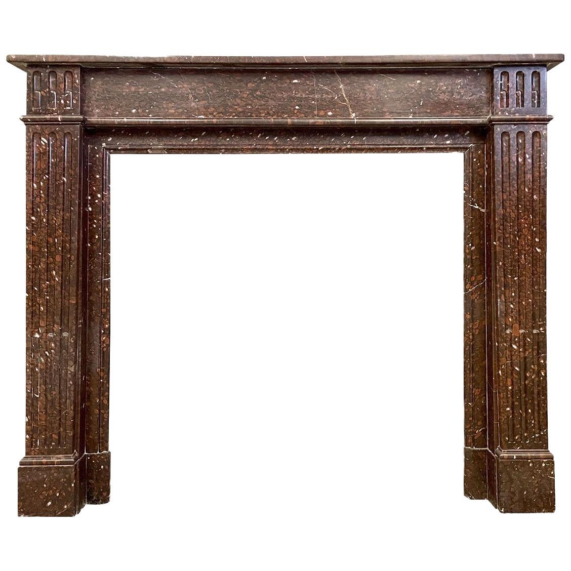 An Antique French Louis XVI Style Fireplace Mantel