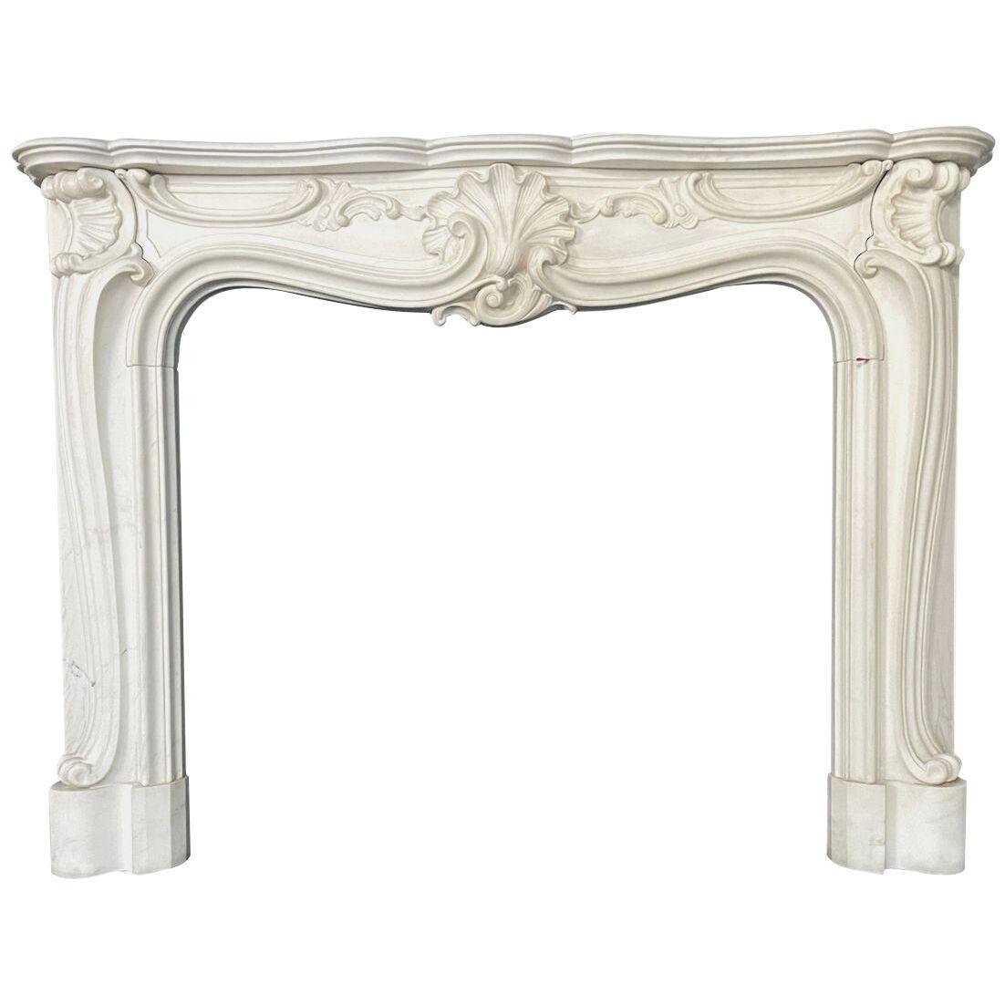 A Reclaimed Rococo French Style Marble Fireplace Mantel 