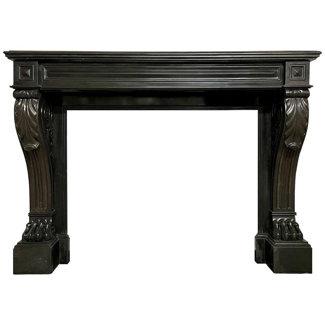 A Large French Empire Black Marble Fireplace Mantel