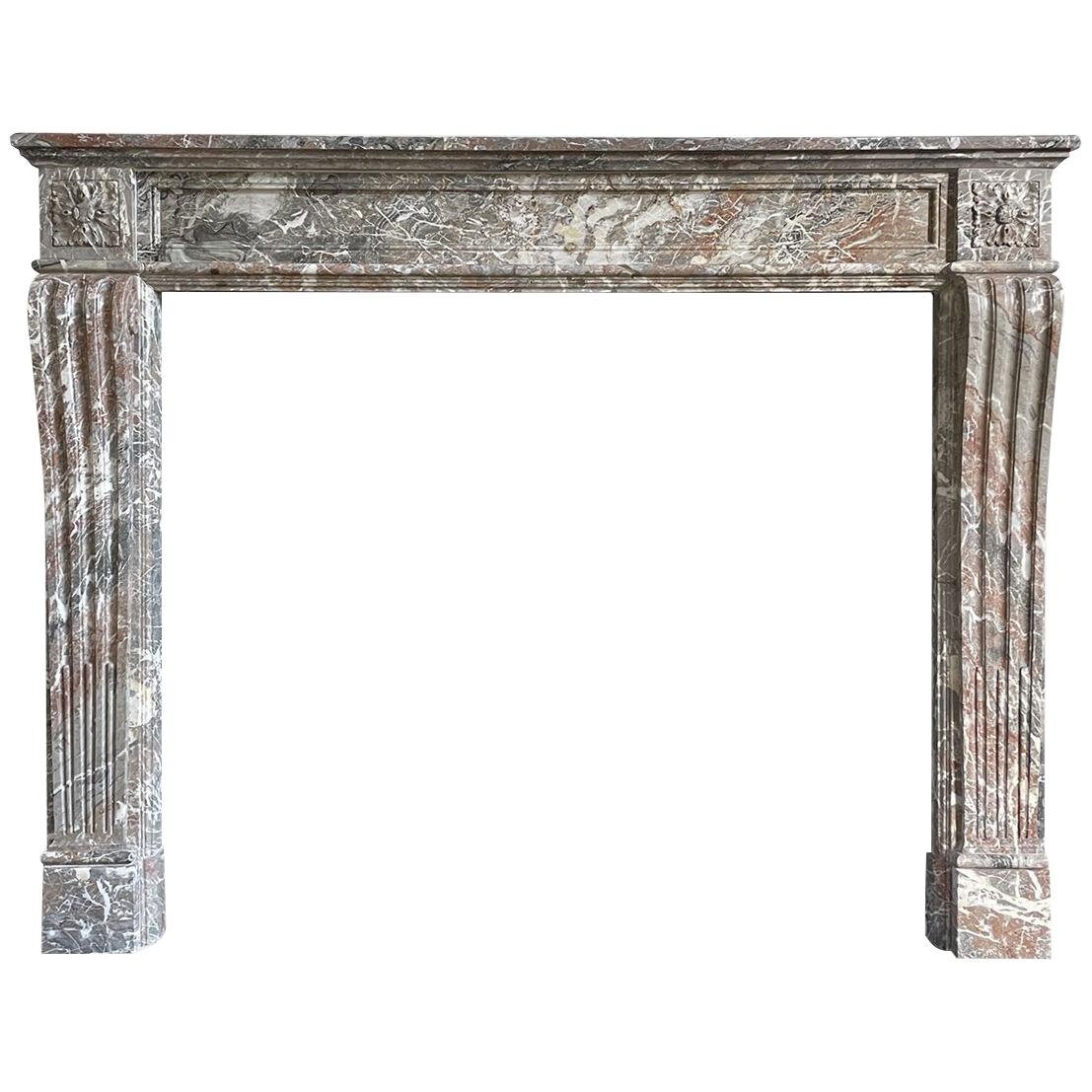 An Antique French Marble Louis XVI Style Fireplace Mantel