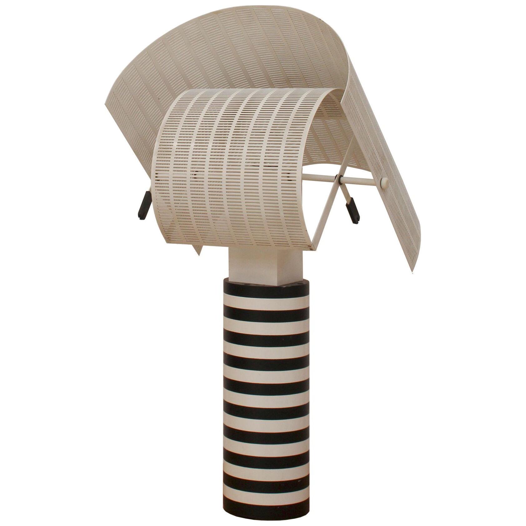 Shogun table lamp designed by Mario Botta for Artemide 
