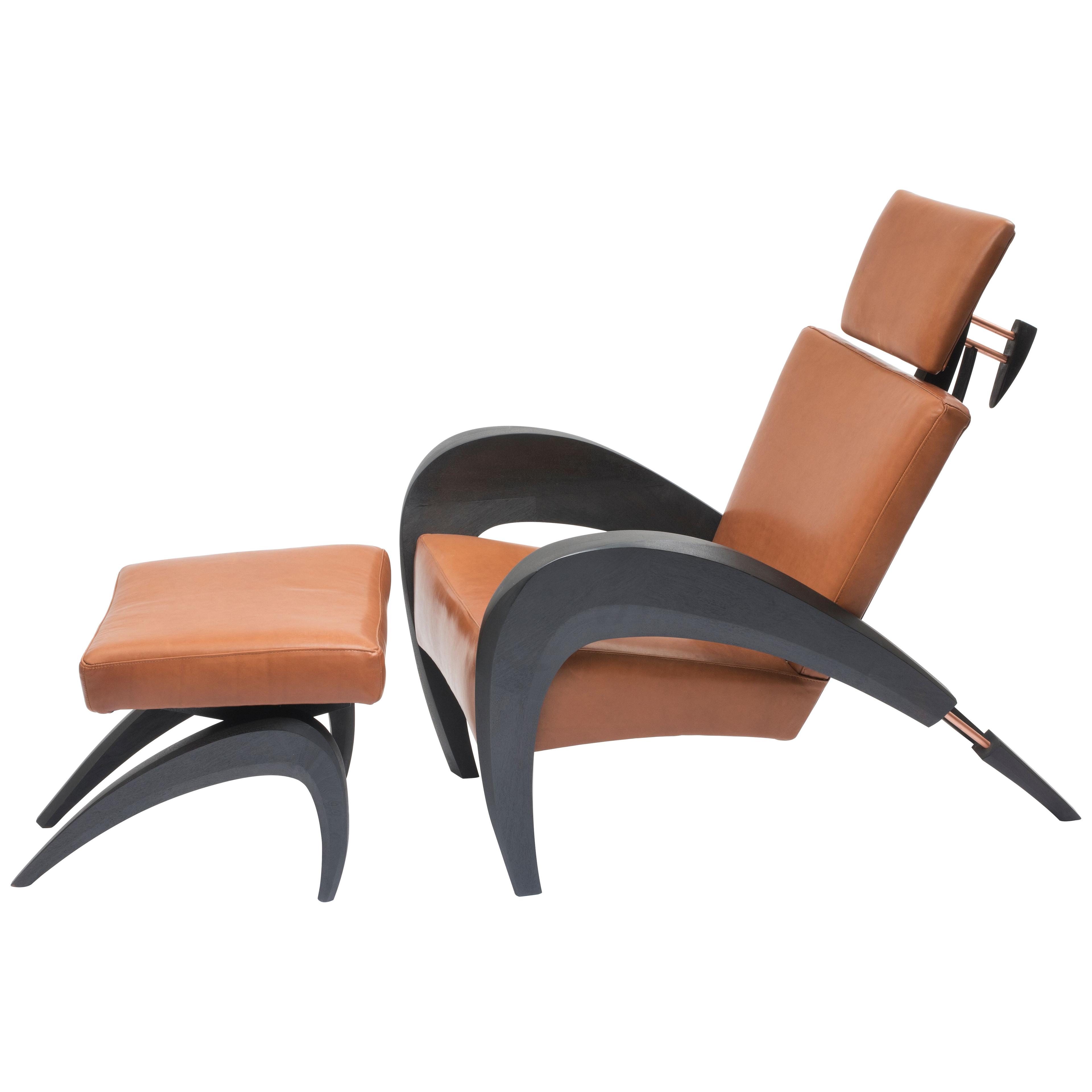 Contemporary walnut and leather armchair and ottoman, Boomerang Chair