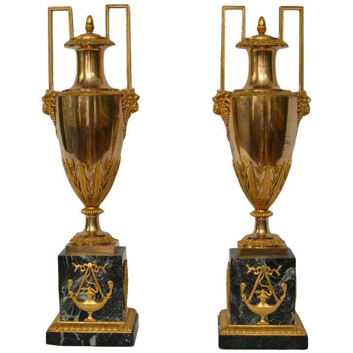 A pair of large gilt bronze vases made ca 1810.