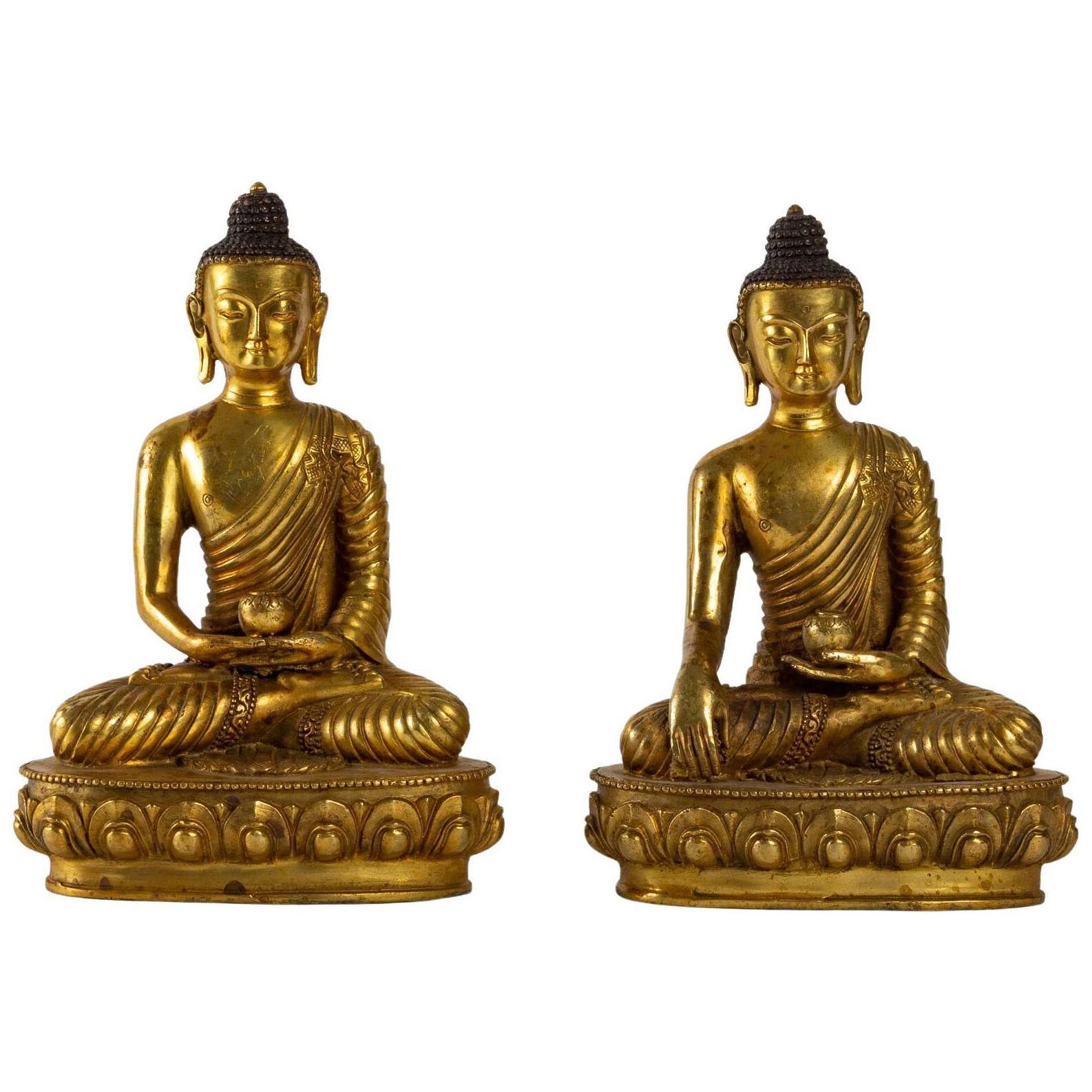 Pair of gilt bronze Buddha