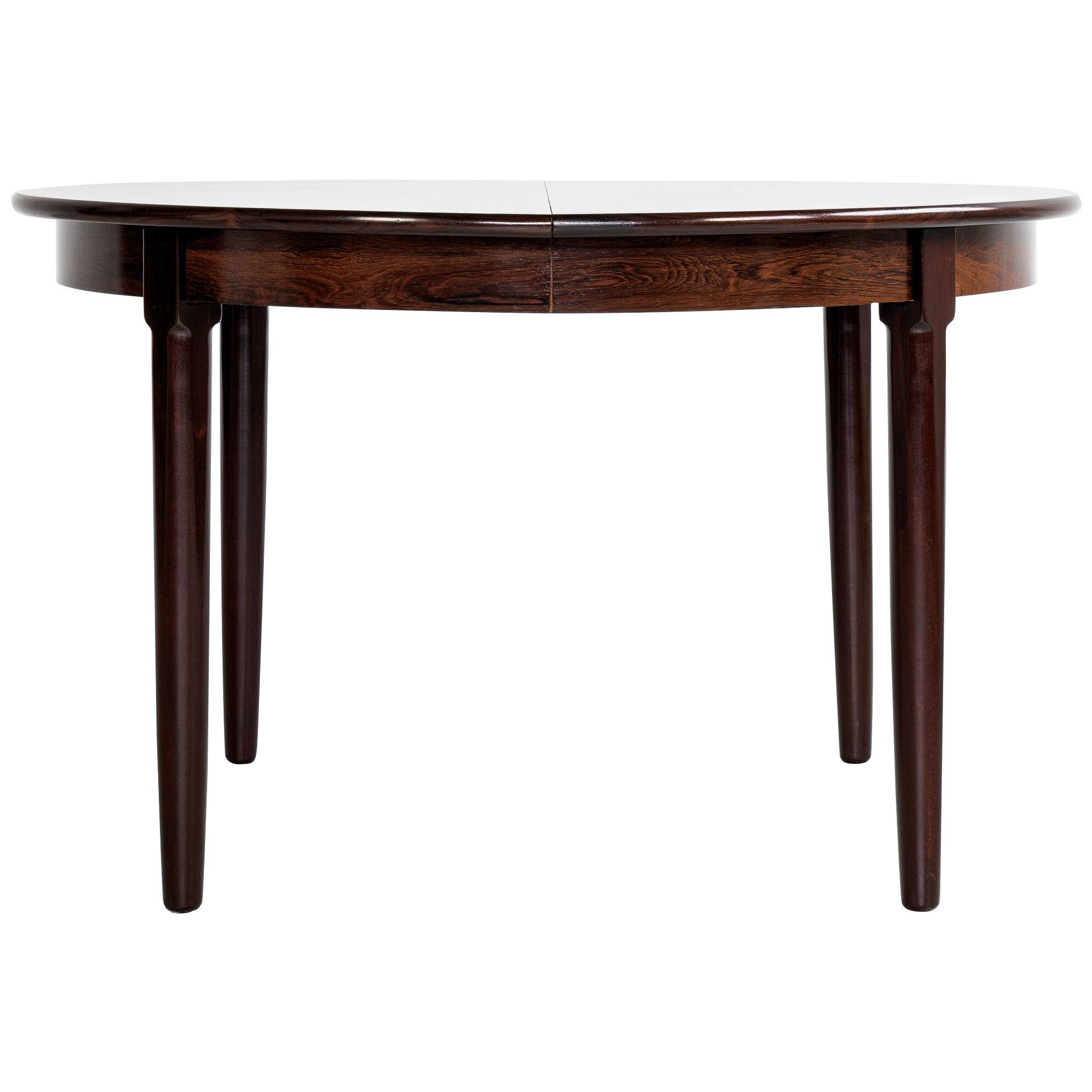 Midcentury Danish round dining table in rosewood 1960s with 4 legs