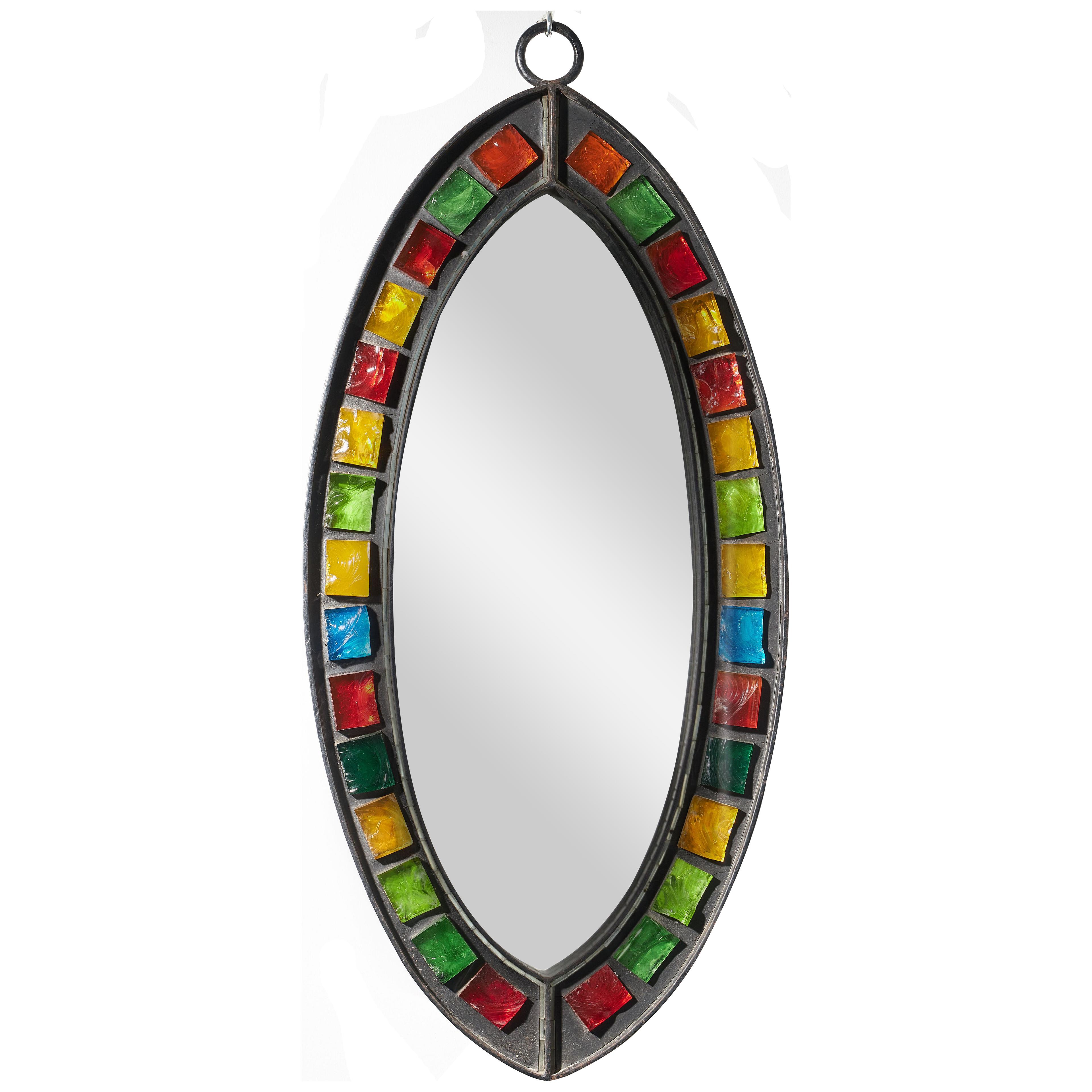 Brutalist iron and coloured glass elliptical mirror
