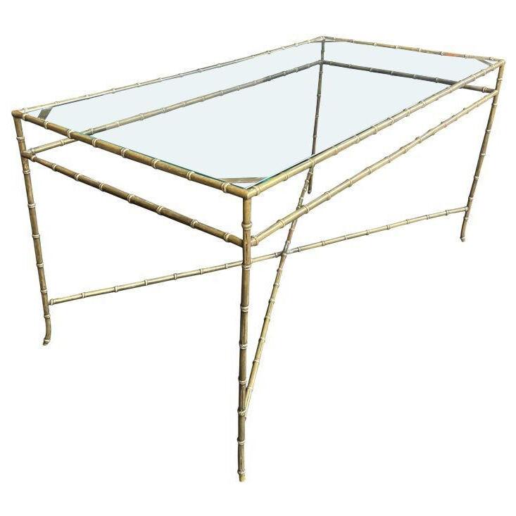 An elegant 1960s Maison Bagues faux bamboo brass coffee table with glass top