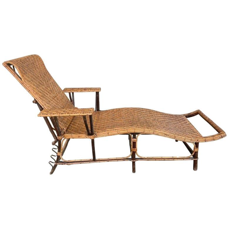 A 1920s French Riviera adjustable woven rattan and bamboo sun lounger