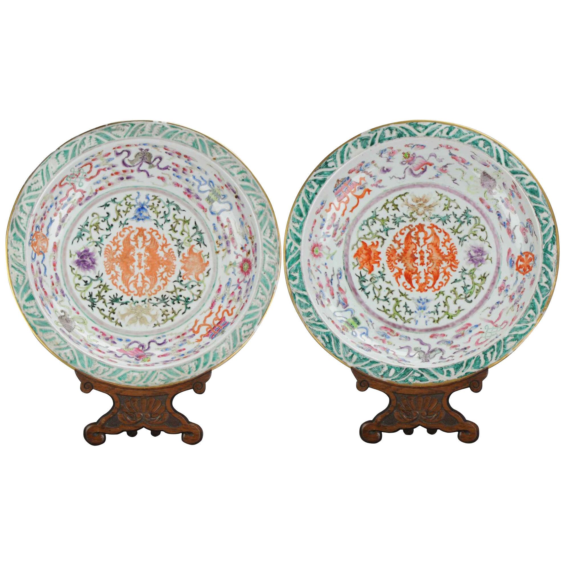 A pair of large famille rose 'phoenix and Buddhist Emblems' chargers 19th