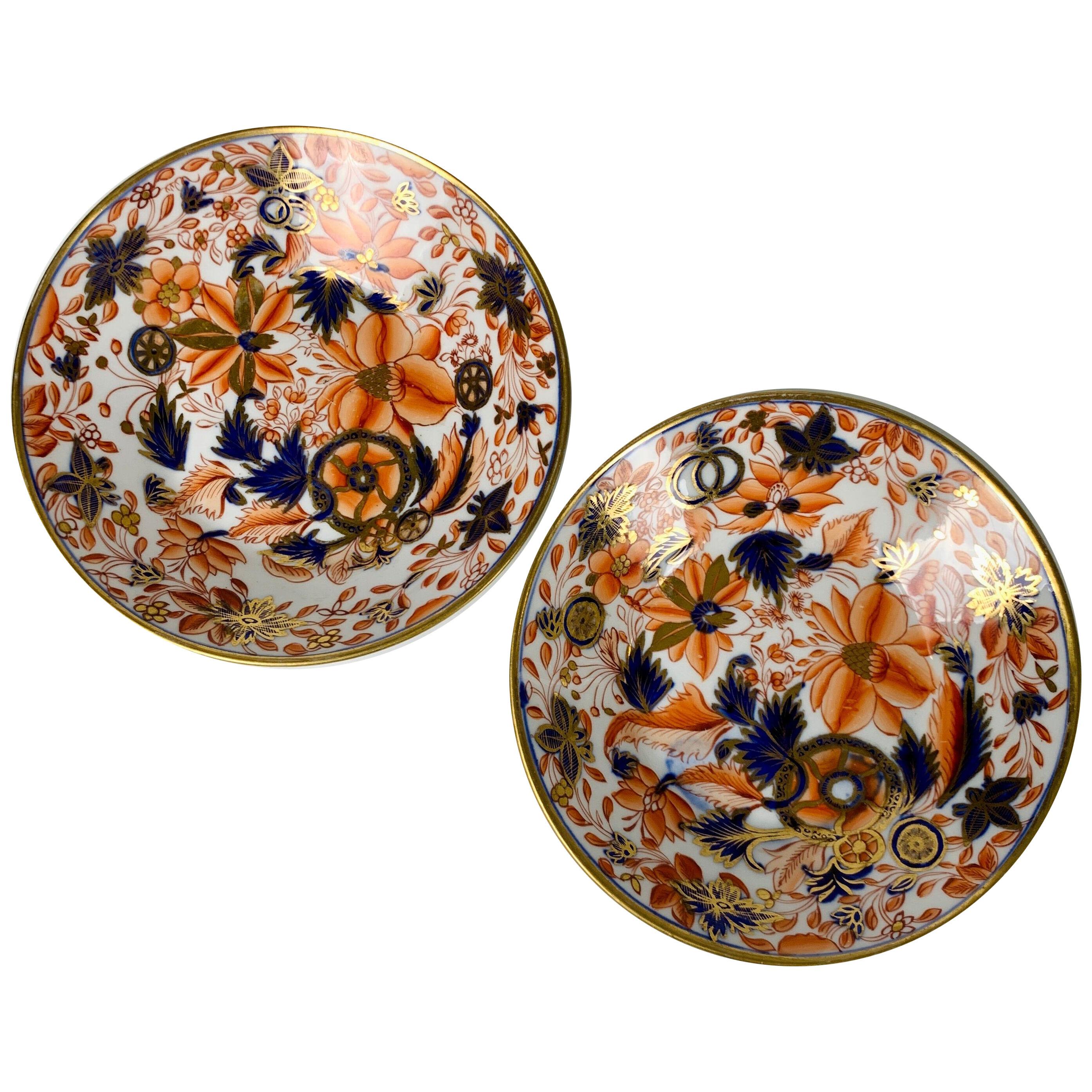 From the Collection of Mario Buatta a Pair of Tobacco Leaf Imari Saucers