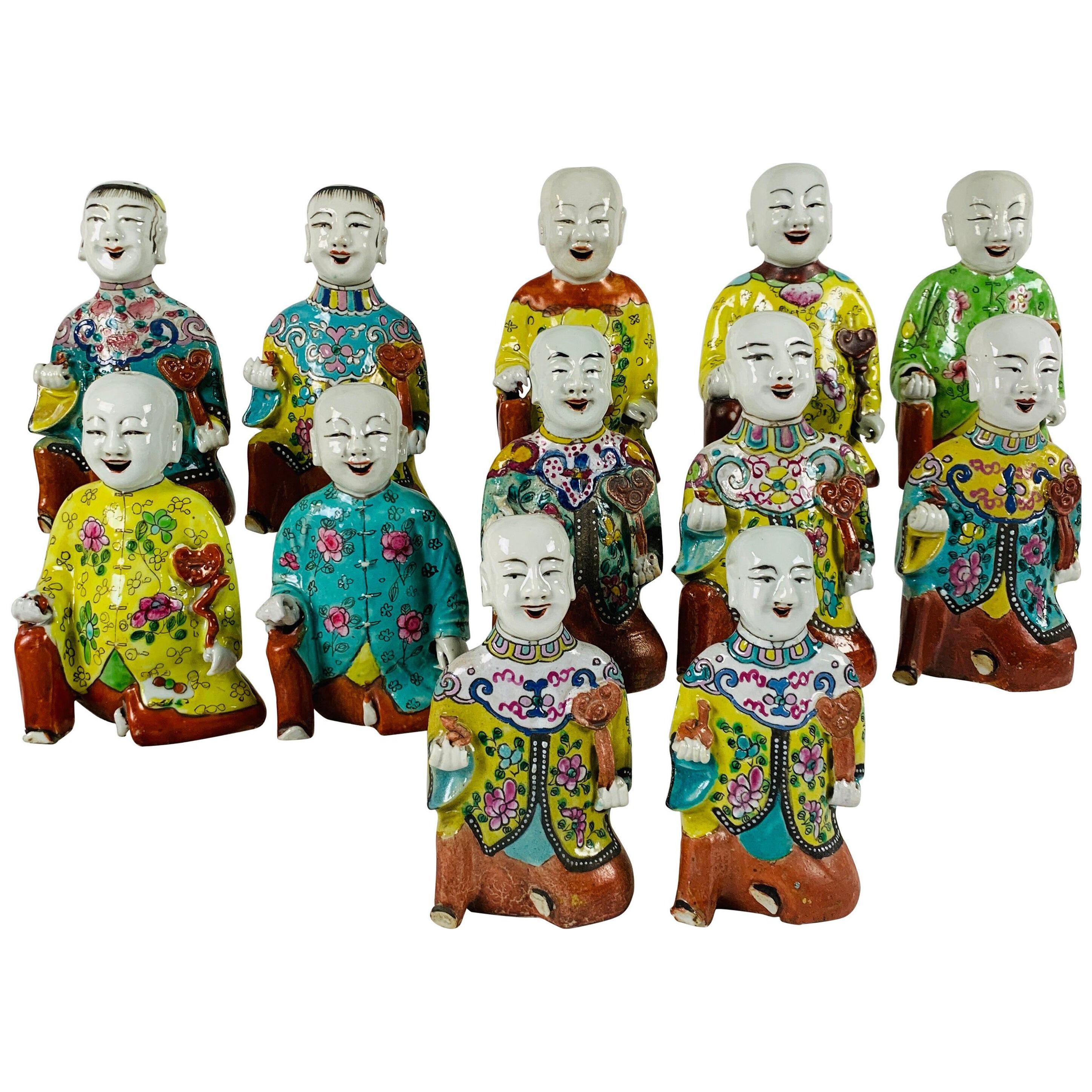 From the Collection of Mario Buatta Set of 12 Chinese "Laughing Boys" circa 1800