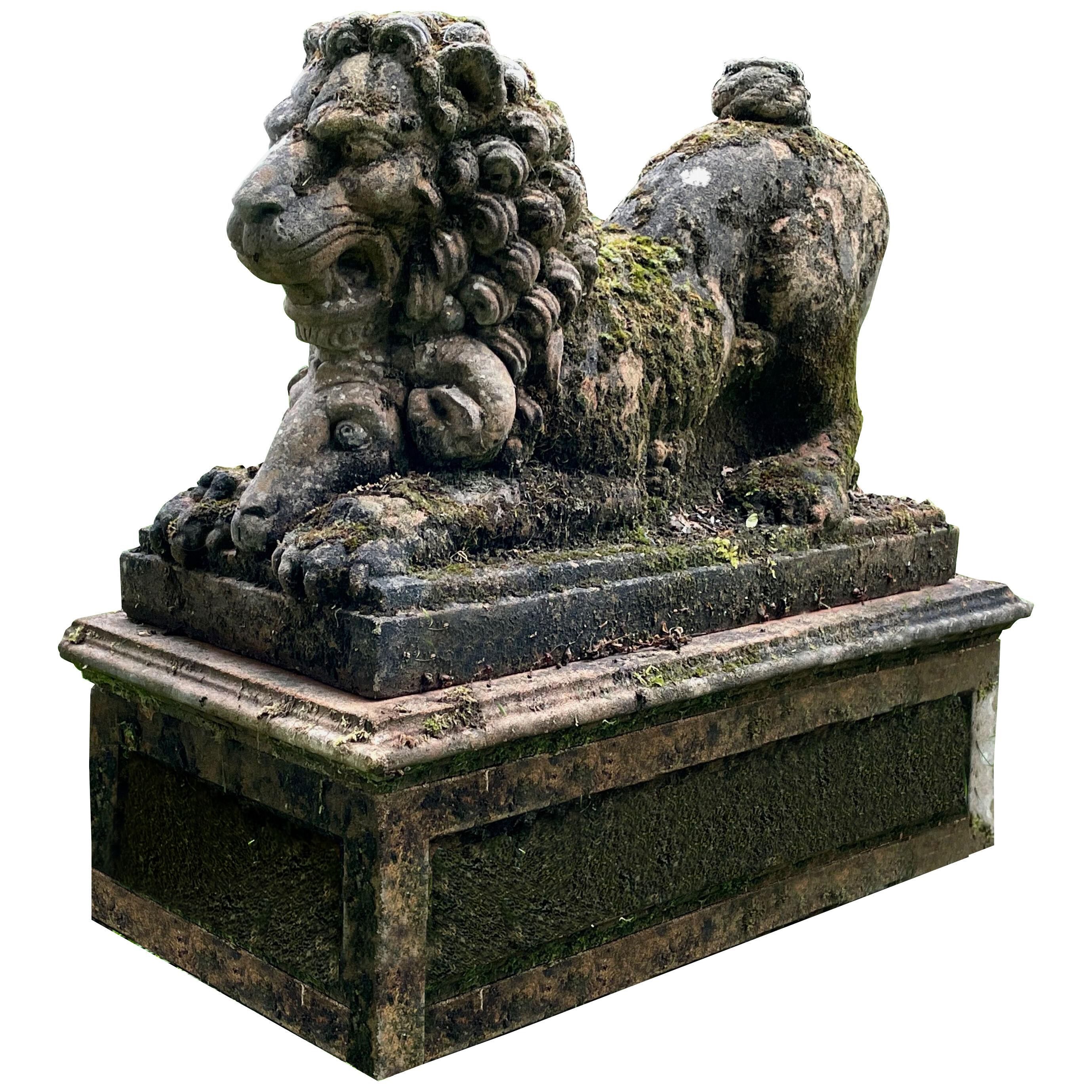 Renaissance style reclining lion in composite stone with its base