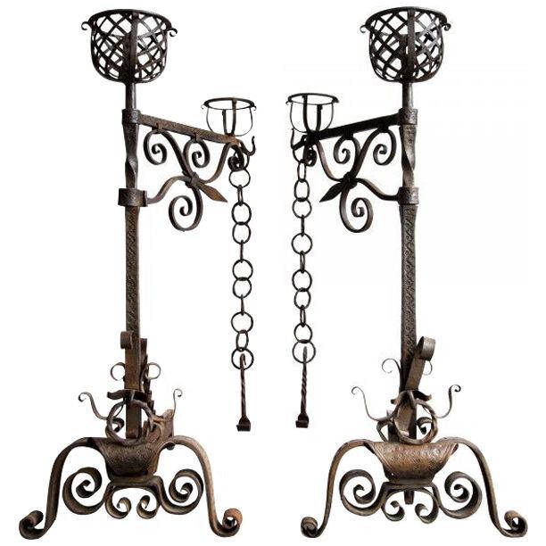 Early 19th century Gothic style iron firedogs