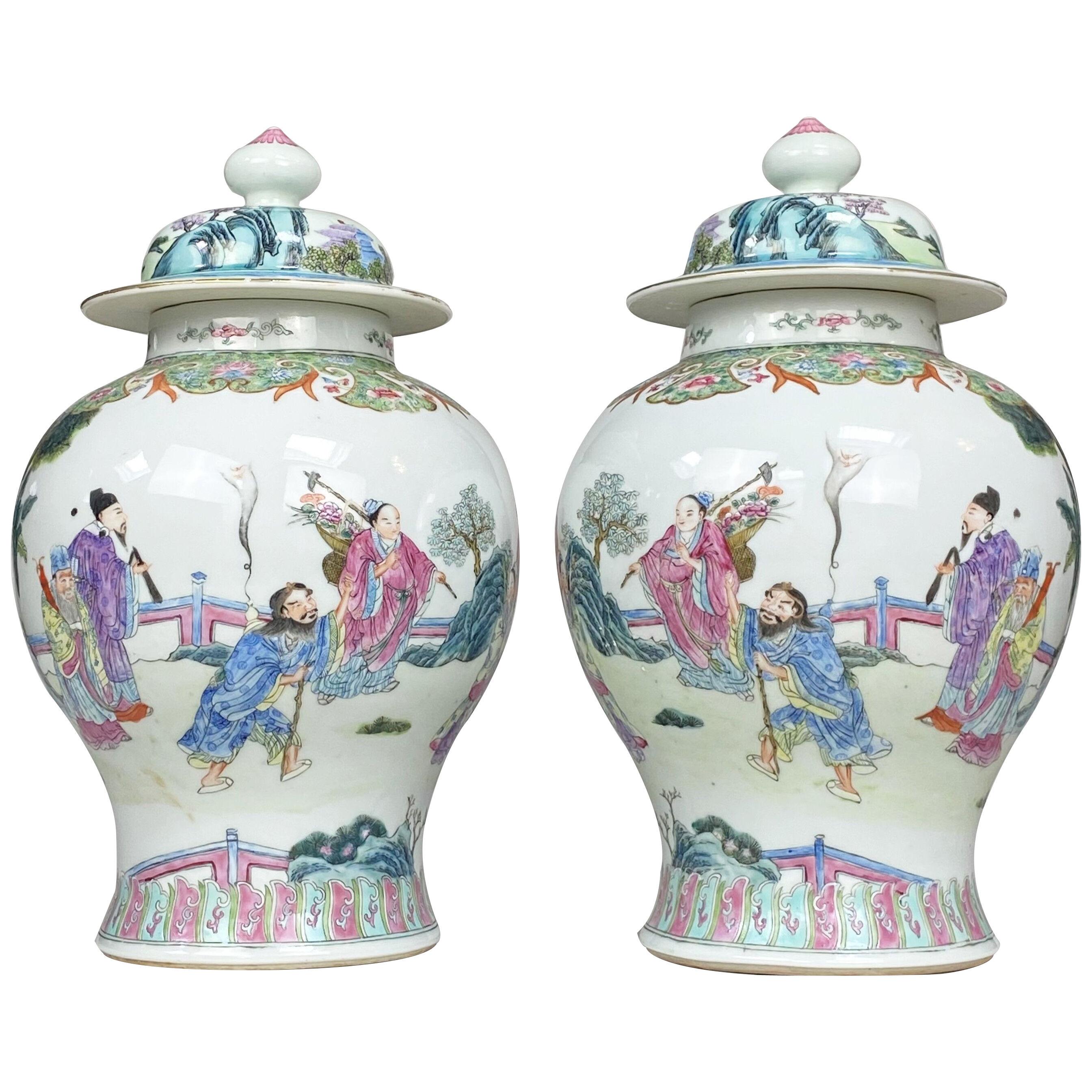 A charming pair of 19th Century Chinese porcelain jars and covers