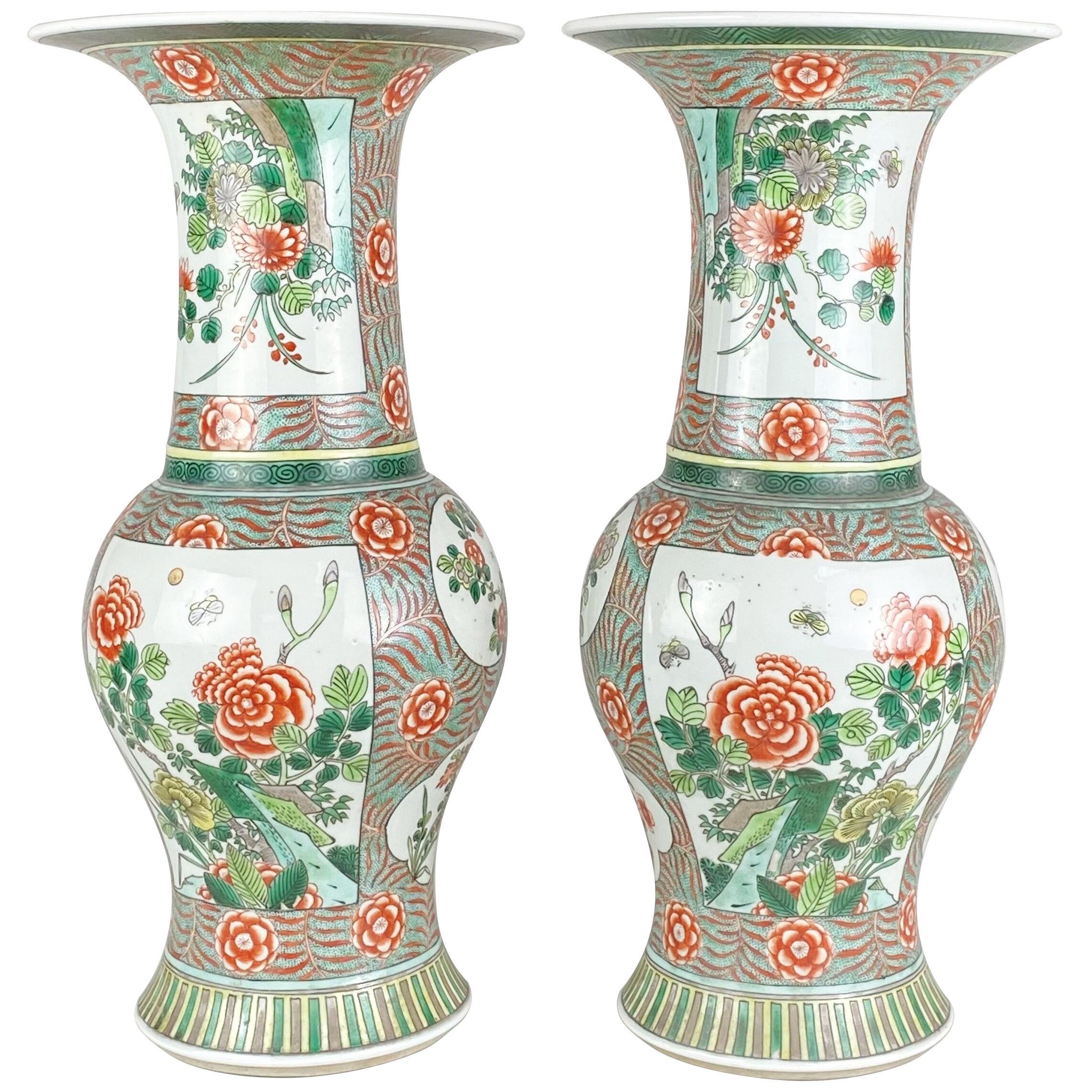A large pair of antique Chinese 19th Century flare top Famille Rose vases