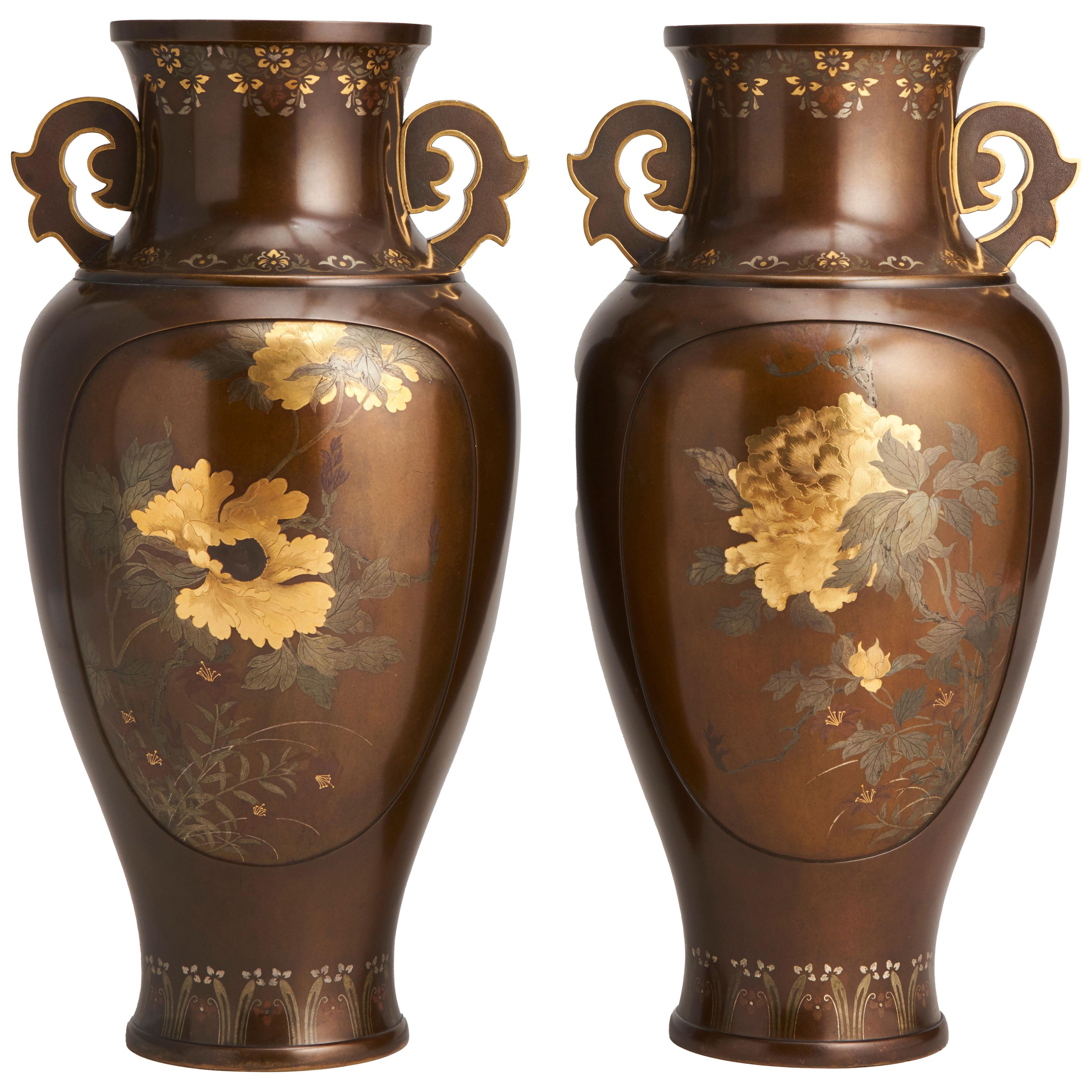 A beautiful pair of inlaid Japanese late 19th Century Bronze vases