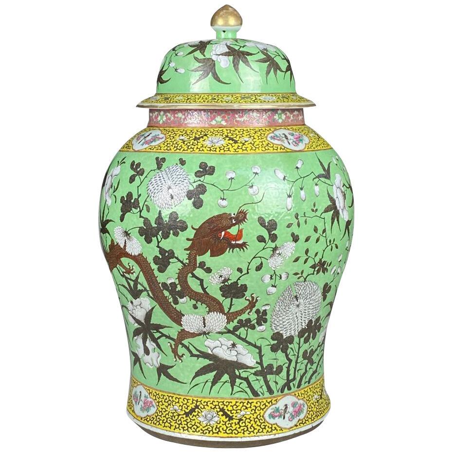 A large Chinese, 19th Century green ground Baluster vase and cover