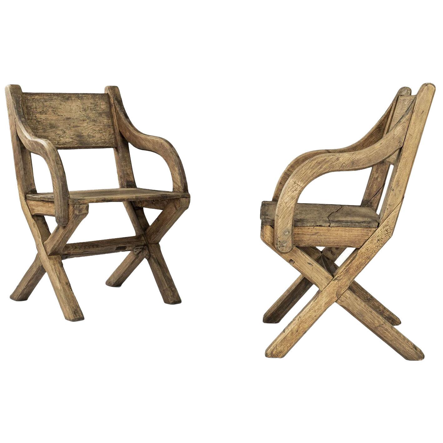 Pair of Early Oak X-frame Armchairs