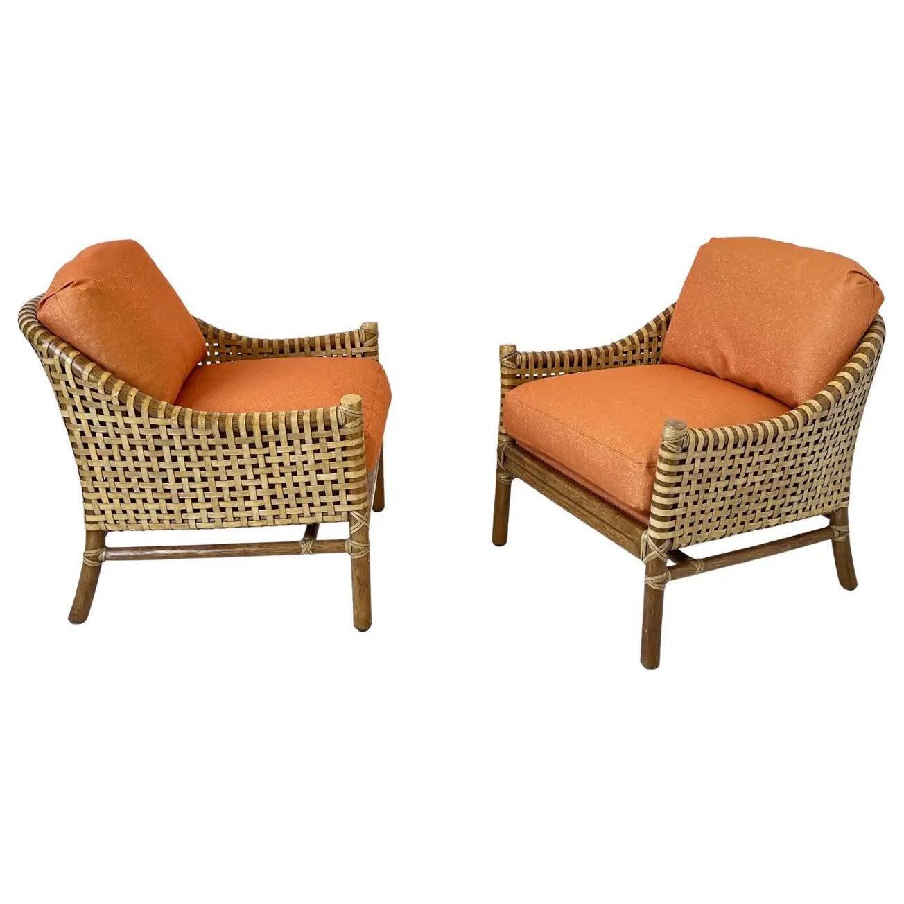 Pair of Orange Rattan Bamboo and Rawhide Lounge Chairs by McGuire