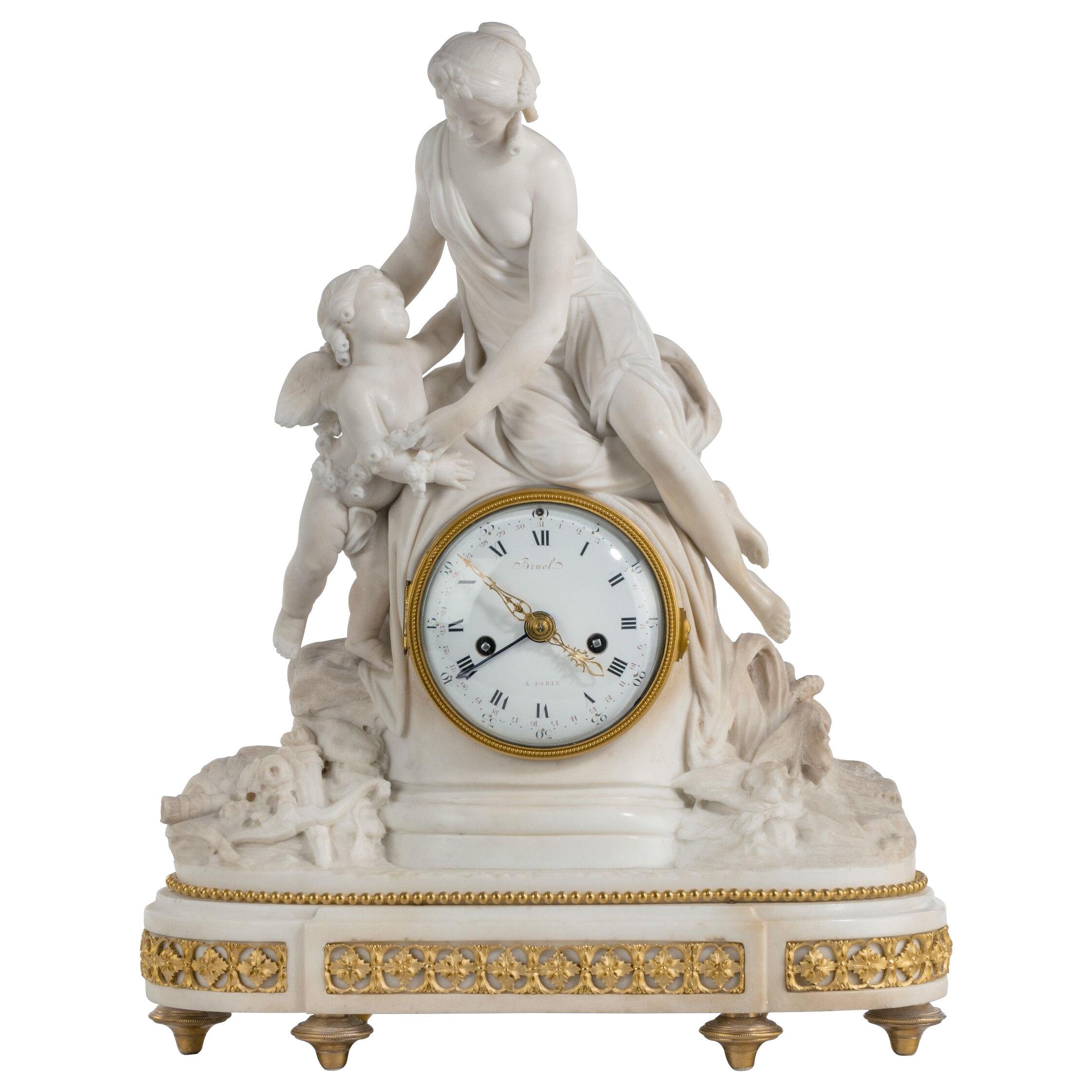 Louis XVI Period Carved Marble Clock by Bruel of Paris