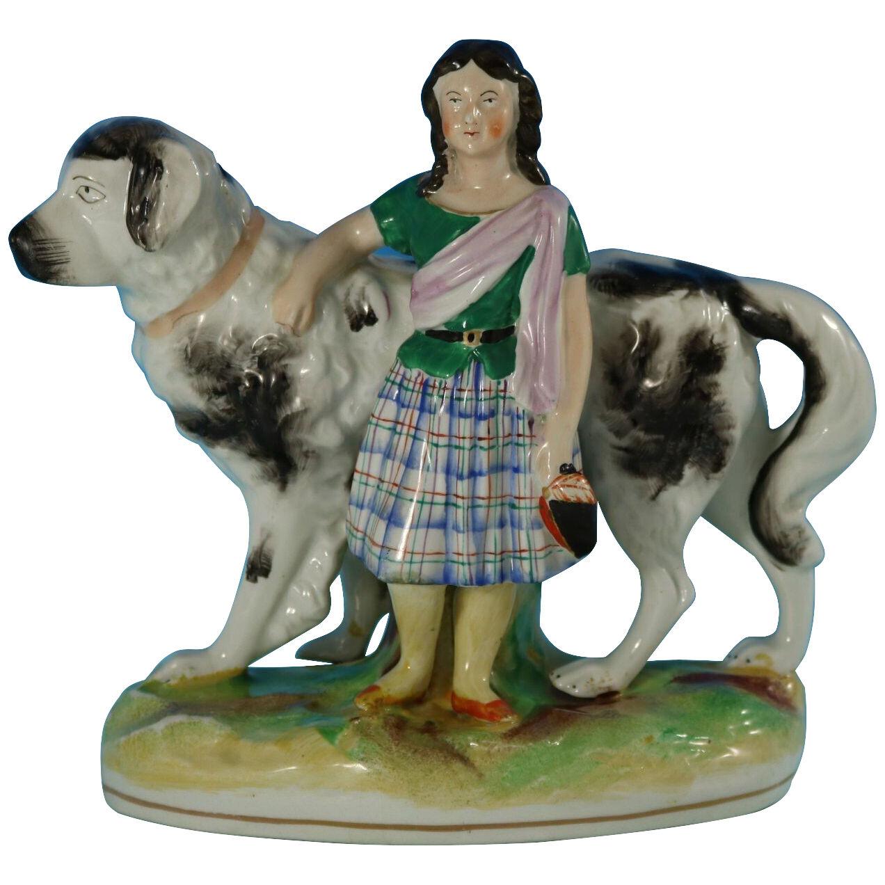 Staffordshire Pottery Girl with St. Bernard Figure