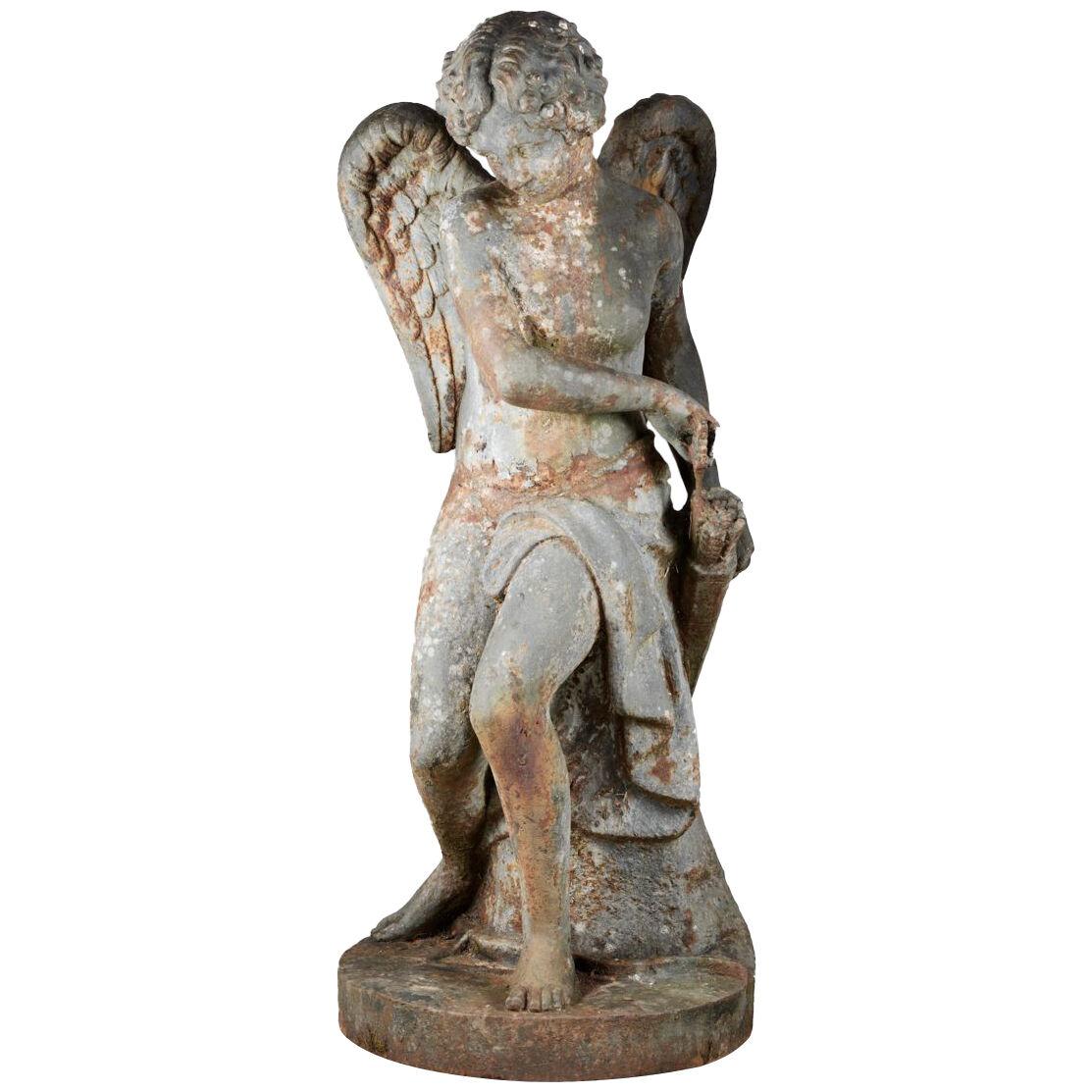 19th Century Cast Iron Statue of a Seated Winged Figure