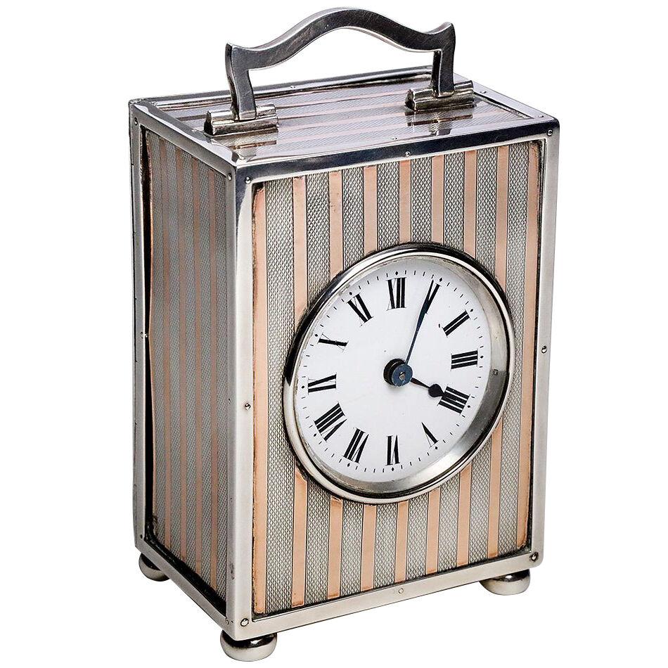 SILVER AND GOLD CARRIAGE CLOCK