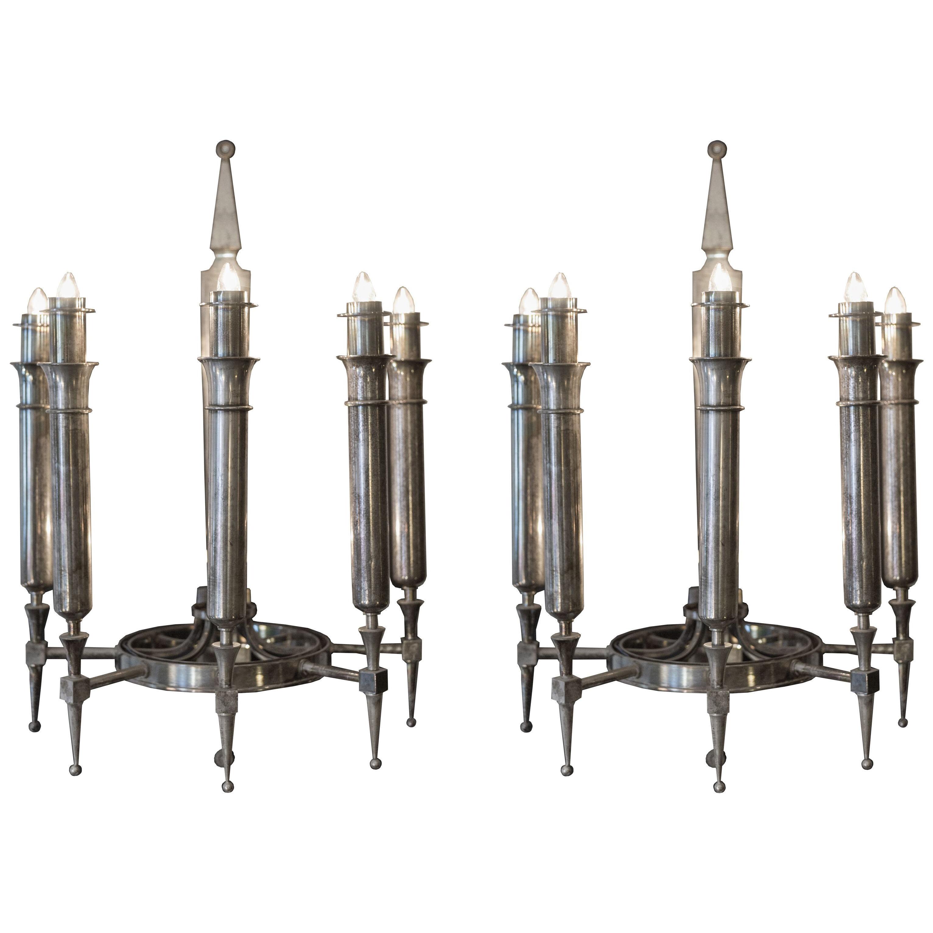 Exceptional pair of large sconces by Gilbert Poillerat .