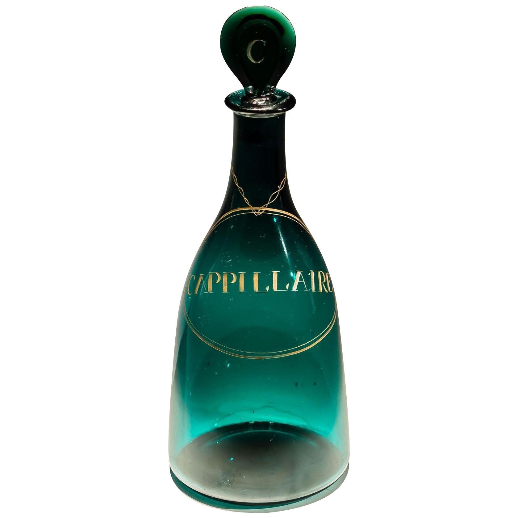 A VERY RARE GREEN DECANTER LABELLED CAPPILLAIRE
