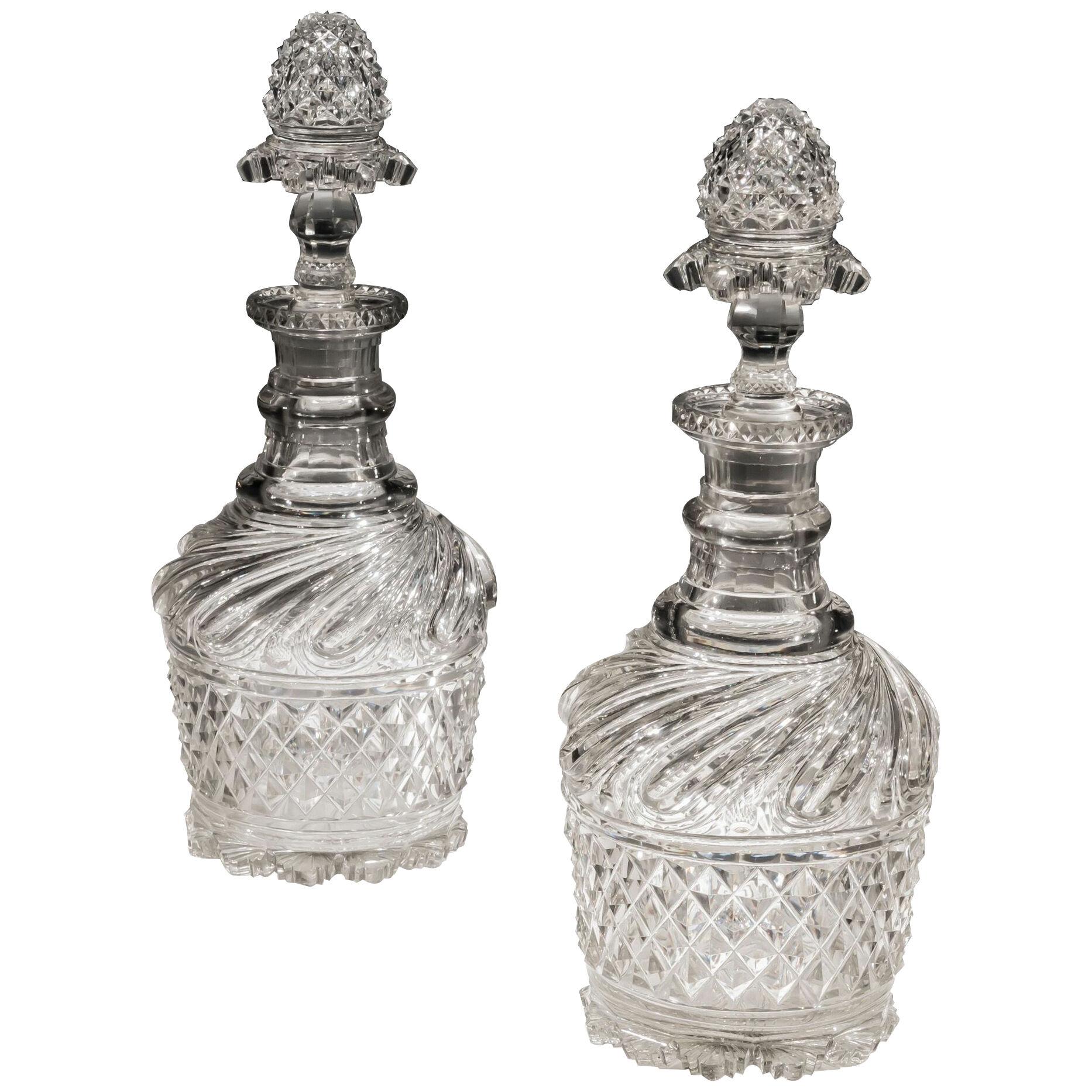 AN EXCEPTIONAL PAIR OF REGENCY CUT GLASS DECANTERS BY PERRIN GEDDES