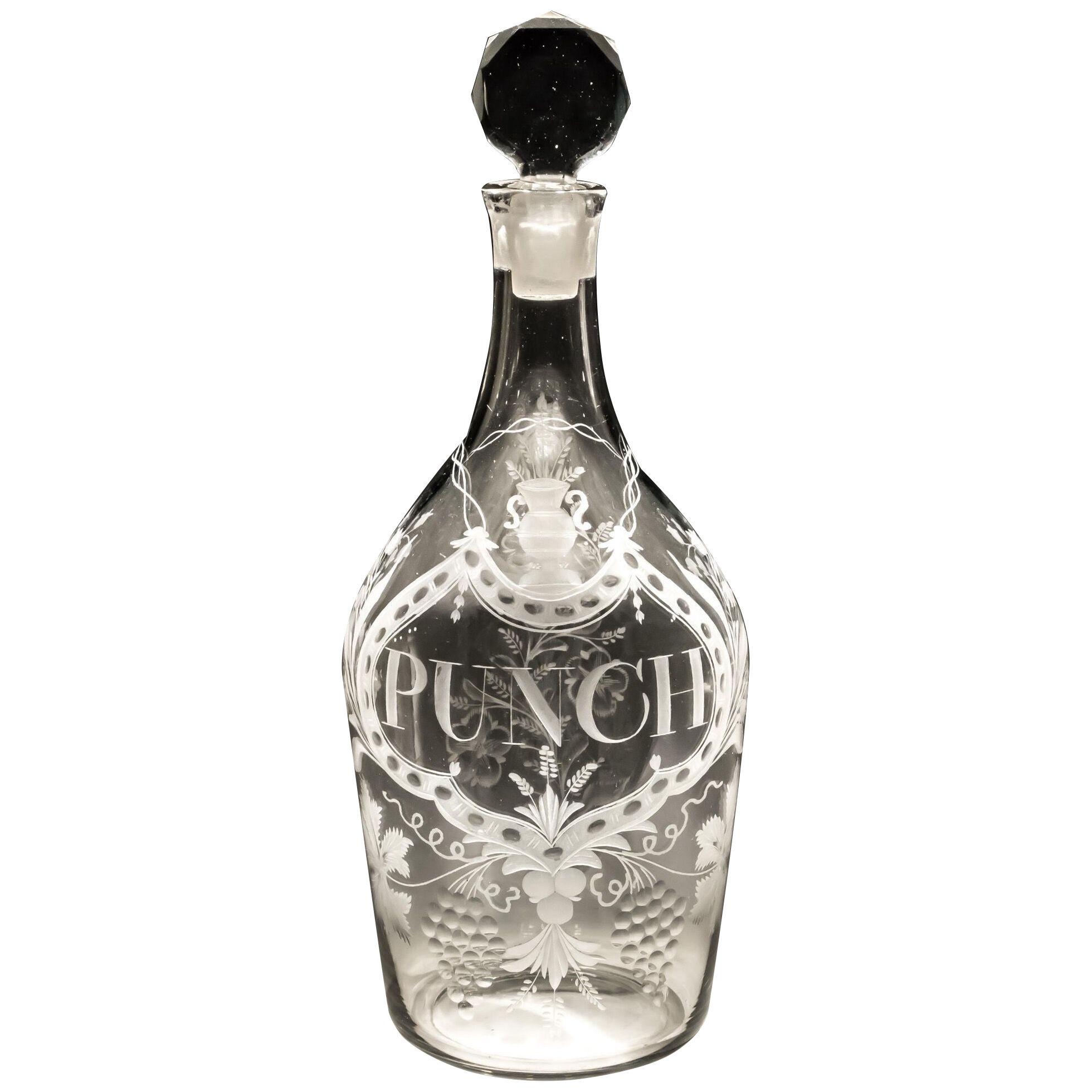 A GEORGE III CUT & ENGRAVED GLASS JEROBOAM PUNCH DECANTER