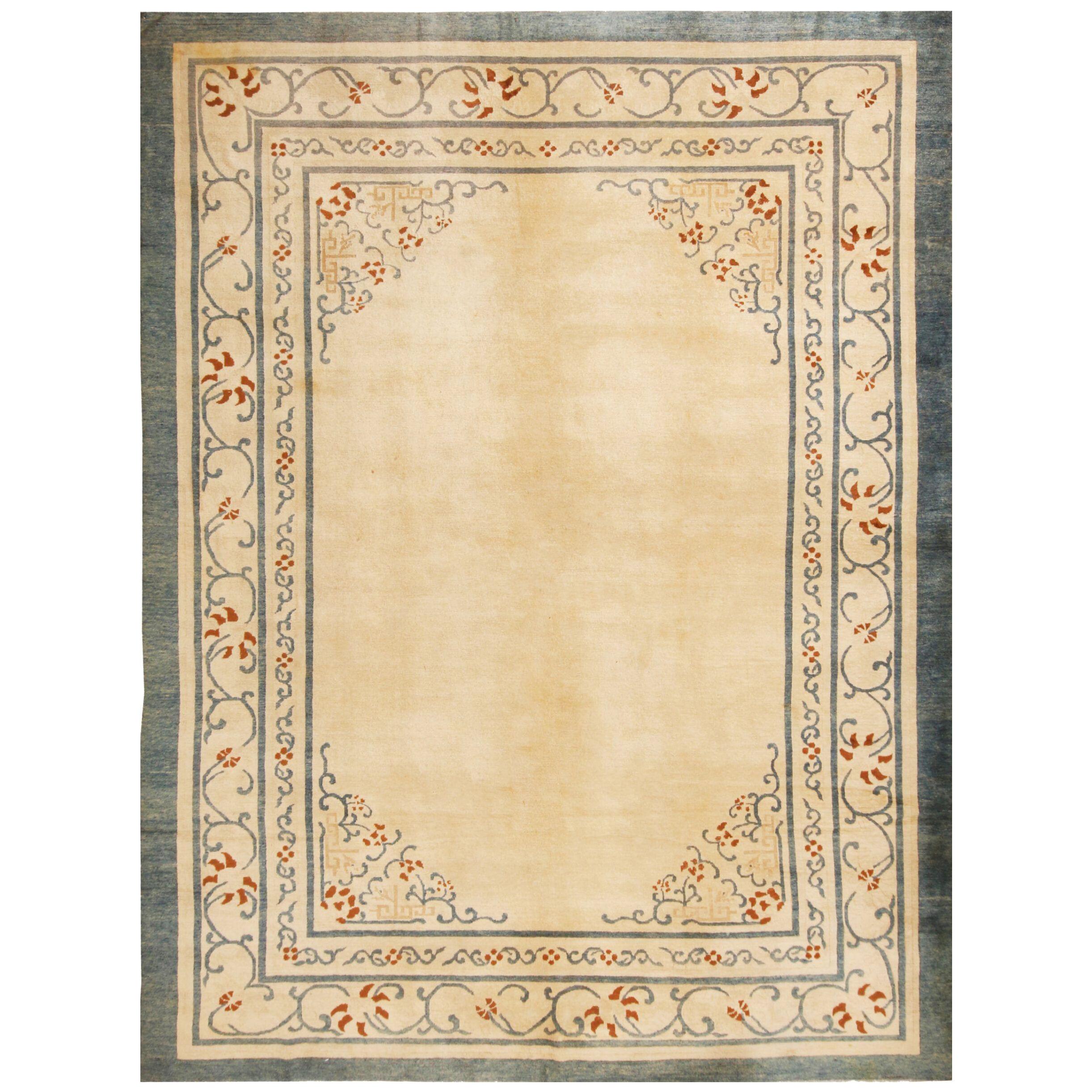 Hand-knotted Antique Chinese Rug in Beige-brown, Blue Open Field, Floral Pattern