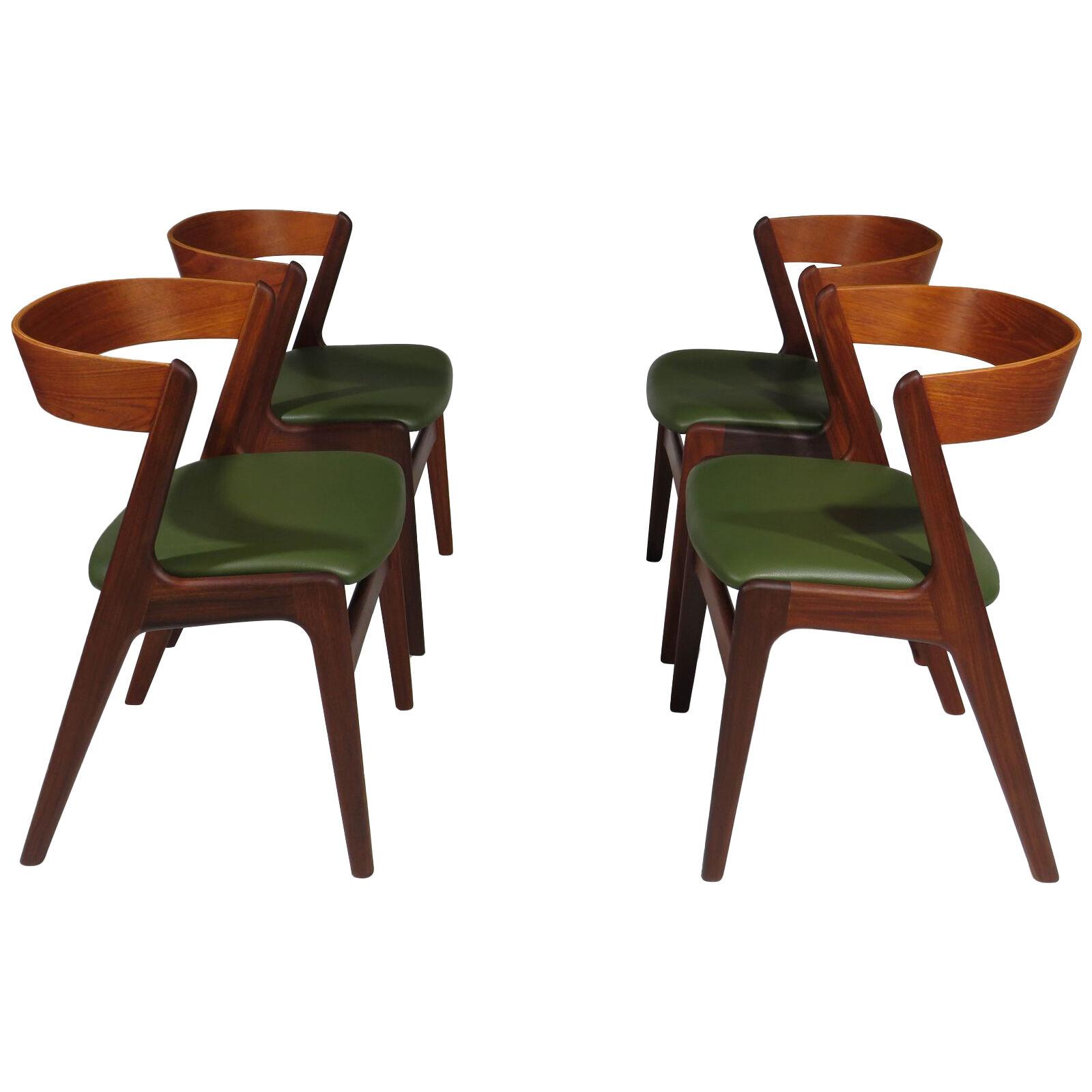 Four Danish Teak Curved Back Dining Chairs