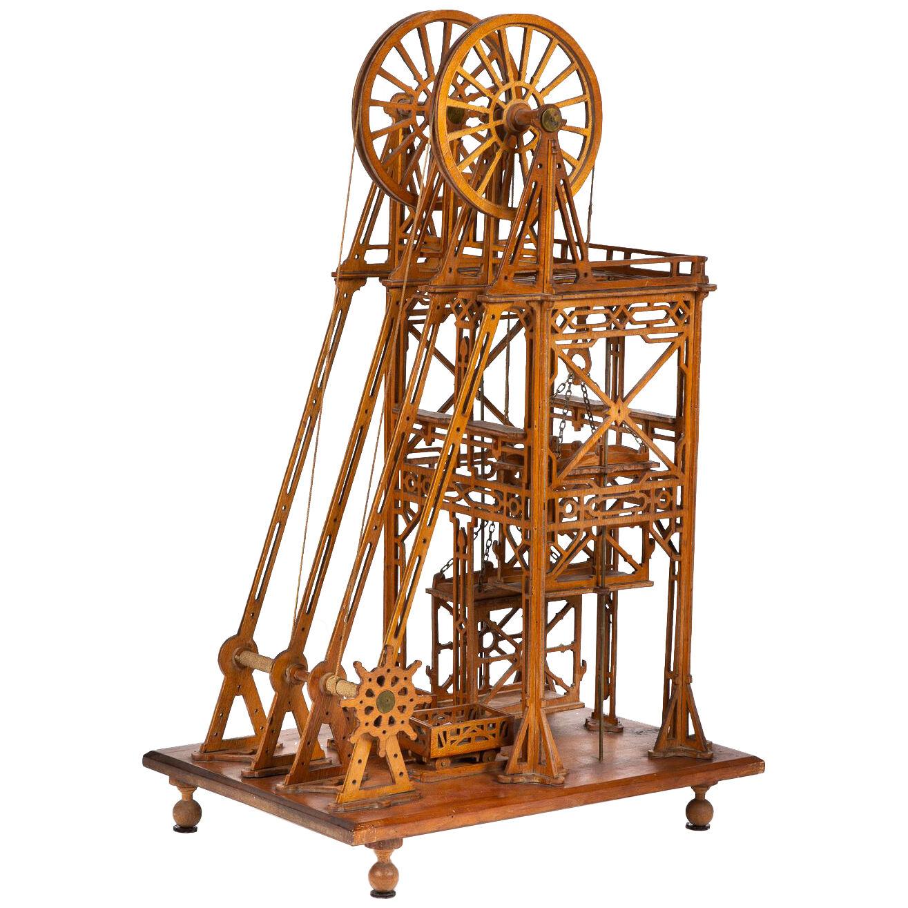 Architectural model of a mine pithead winding gear