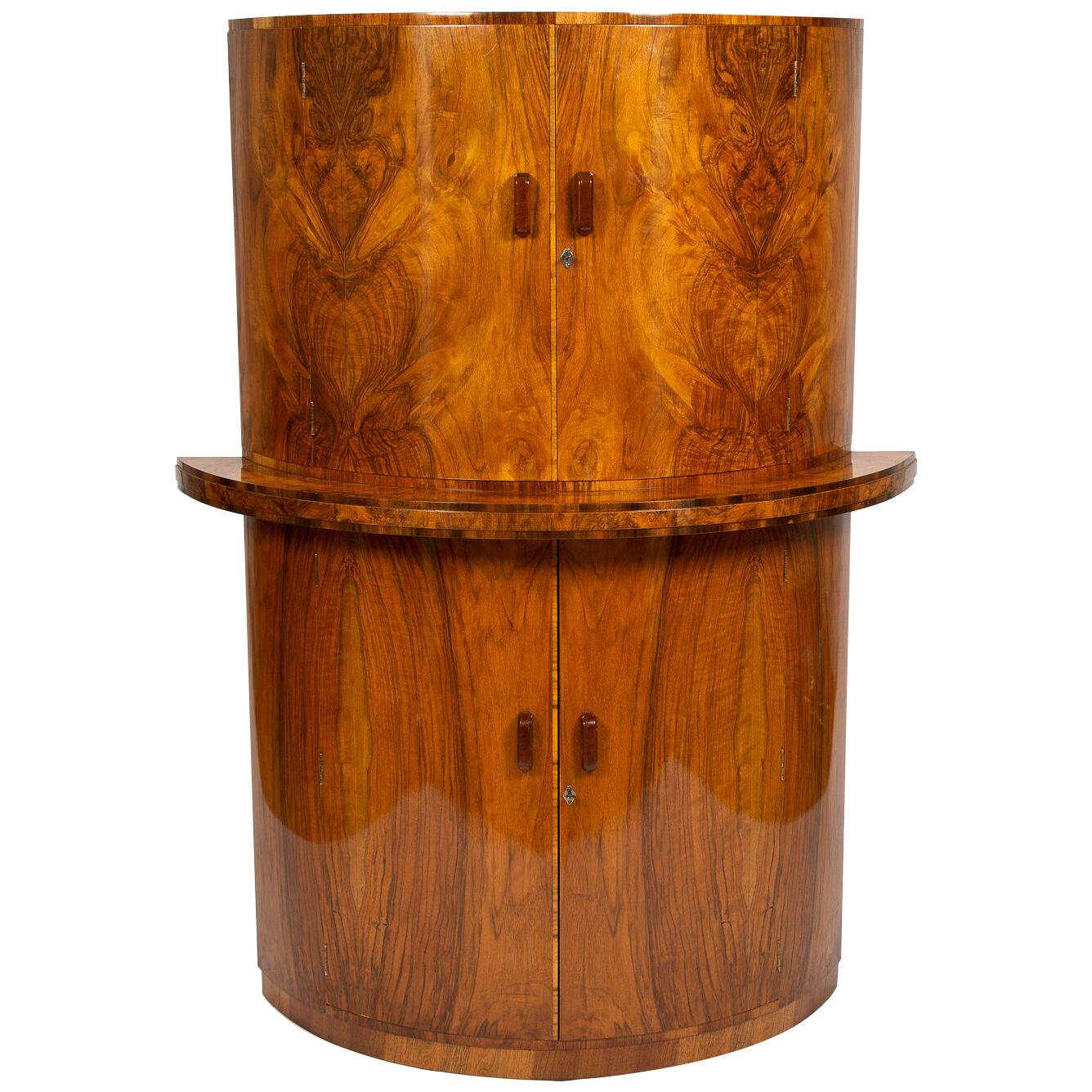 A walnut Art Deco demi-lune cocktail cabinet by Gold Feather, circa 1930.