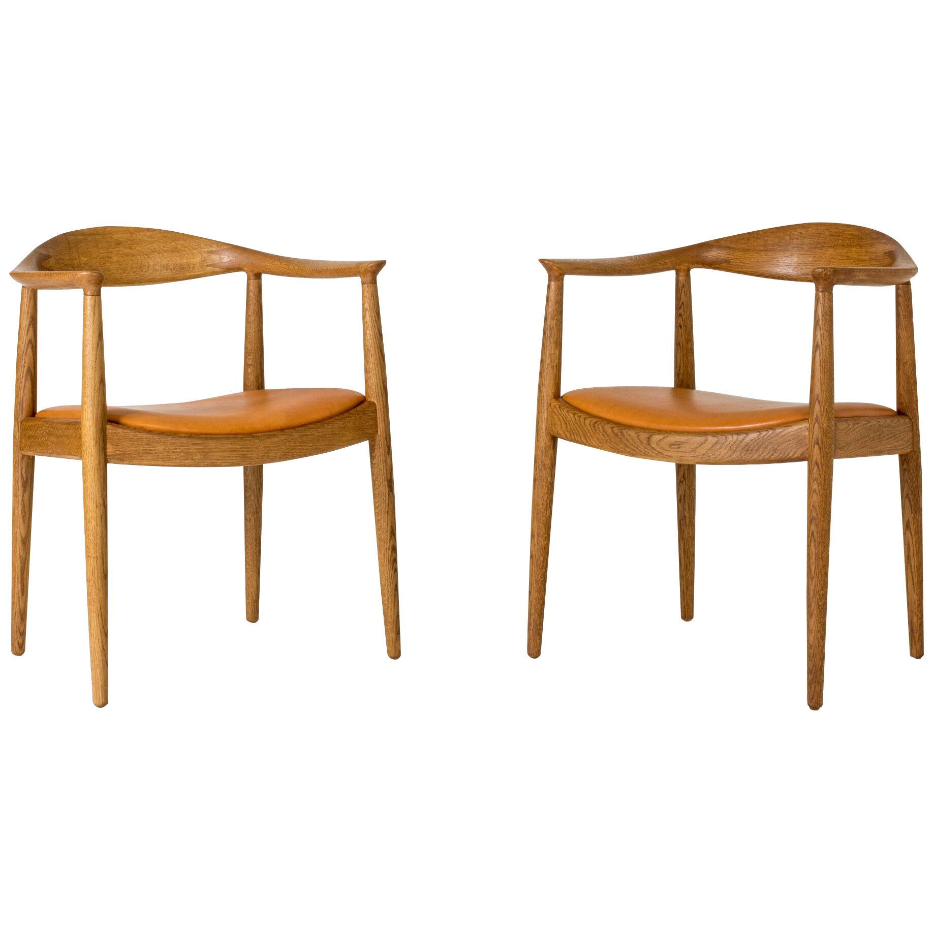 Pair of "The Chair" armchairs by Hans J. Wegner for Johannes Hansen, Denmark. 
