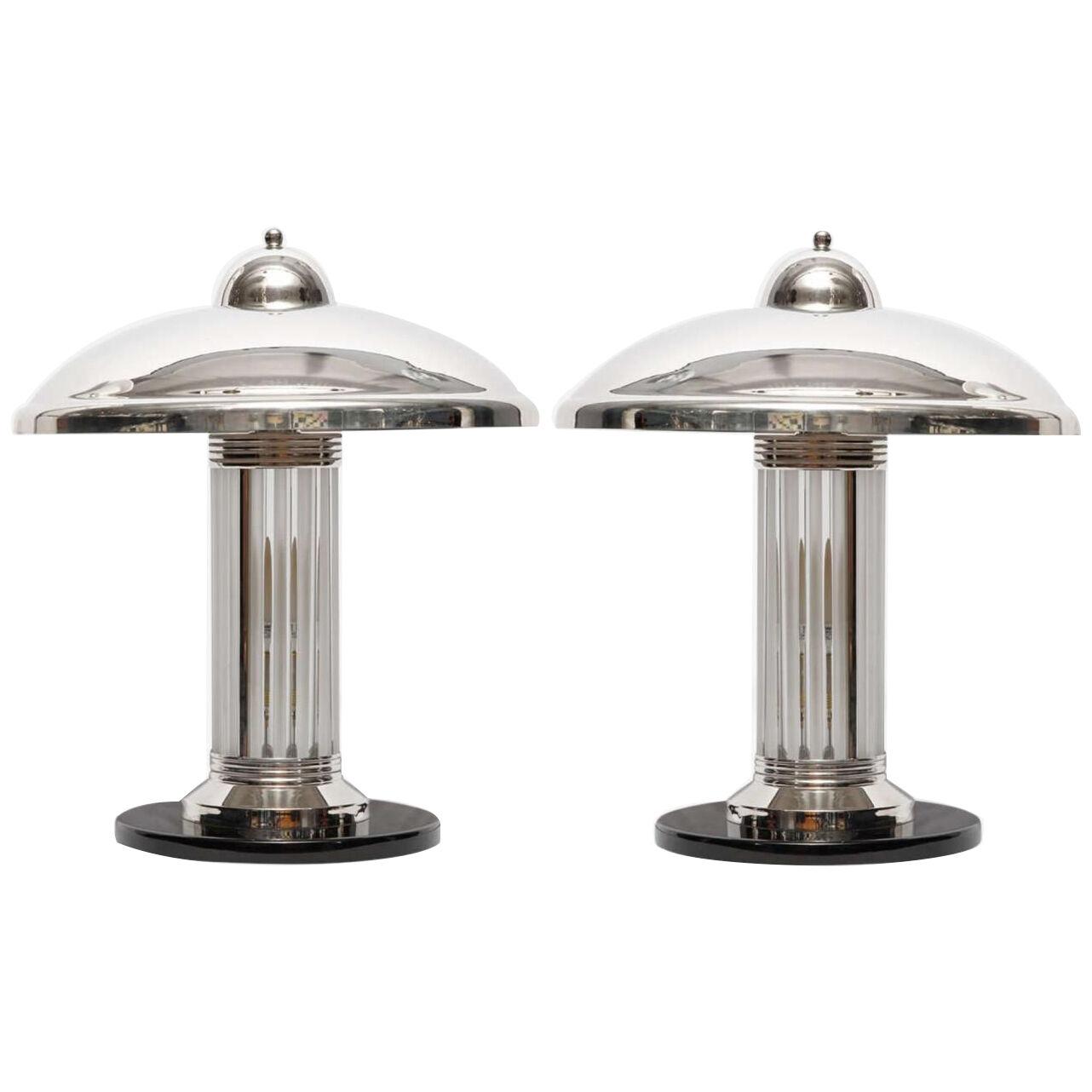 Pair of Art Deco style chrome and glass table tamps
