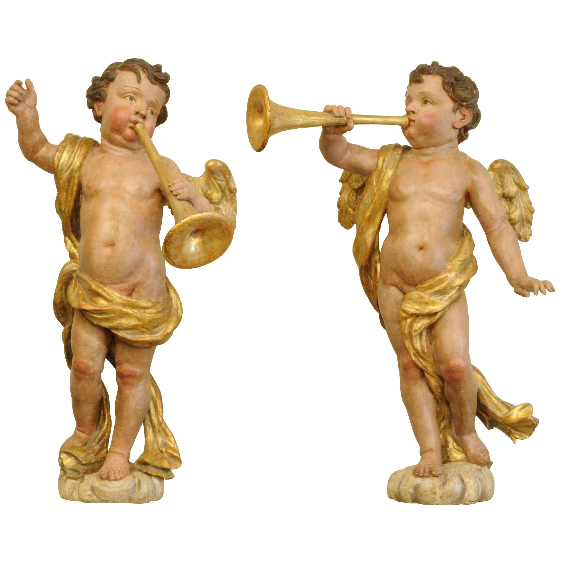 Pair of 18th Century Carved Trumpeting Angels