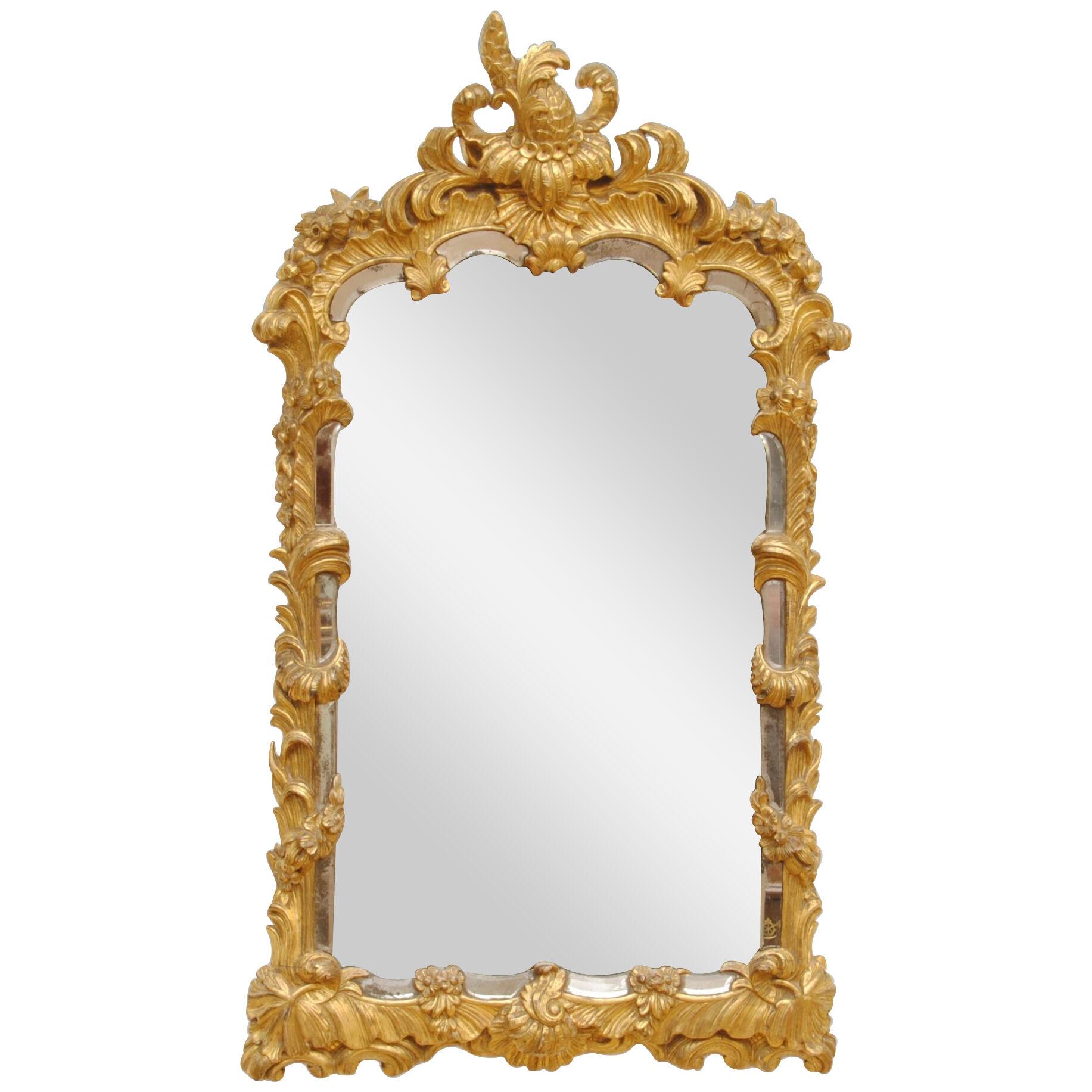 LATE 18TH CENTURY GILT WOOD AND BORDERED MIRROR