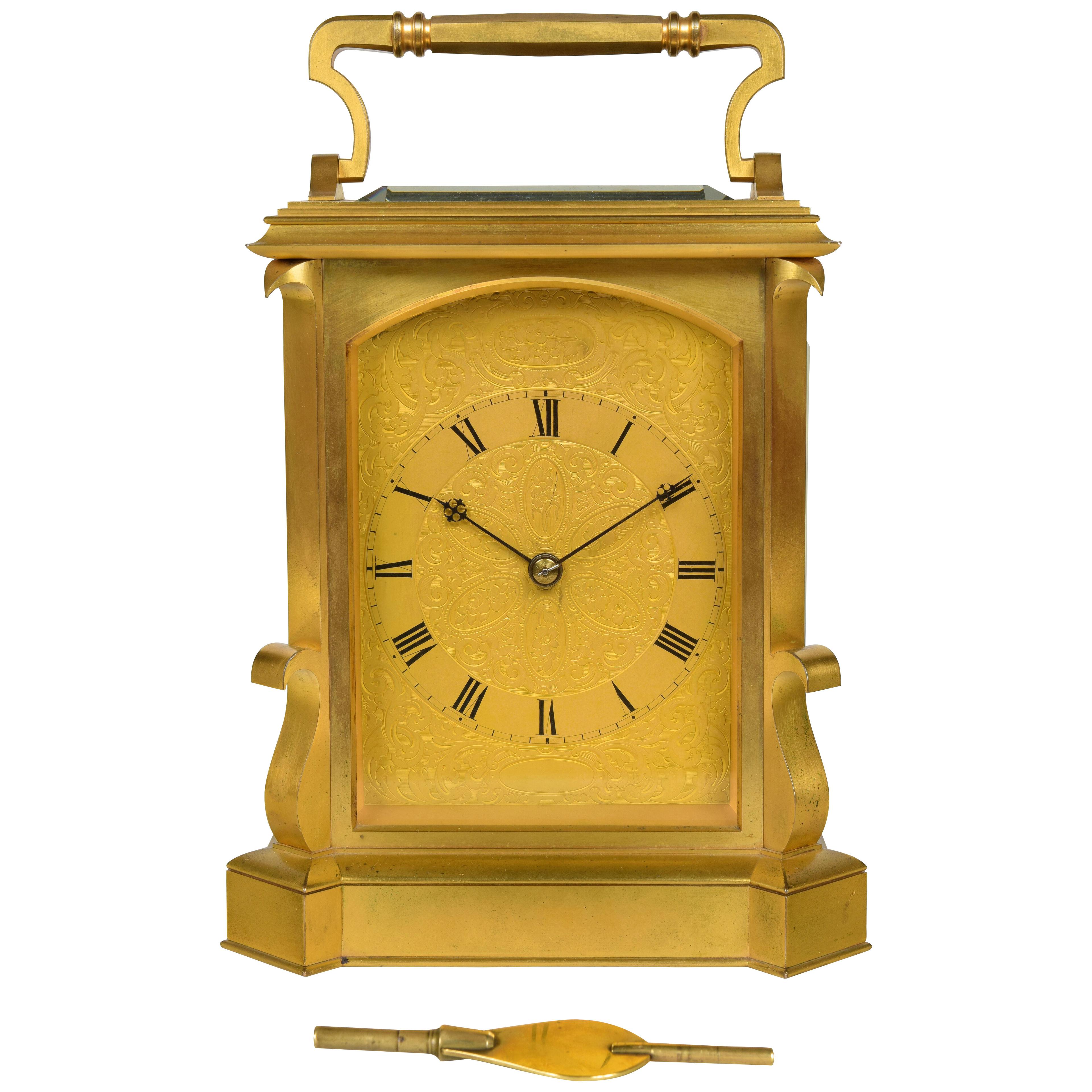 JOHN MOORE AND SONS. AN EXCEPTIONAL GIANT GILT BRONZE CARRIAGE CLOCK