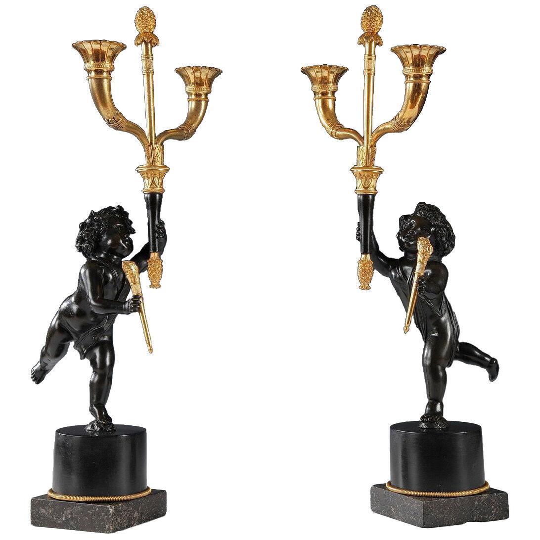 Pair of Black Marble and Gilded Bronze Candelabras "Aux Amours", France, c. 1800